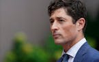 Mayor Jacob Frey took a question during a press conference outside the Hennepin County Government Center Tuesday in Minneapolis. ]