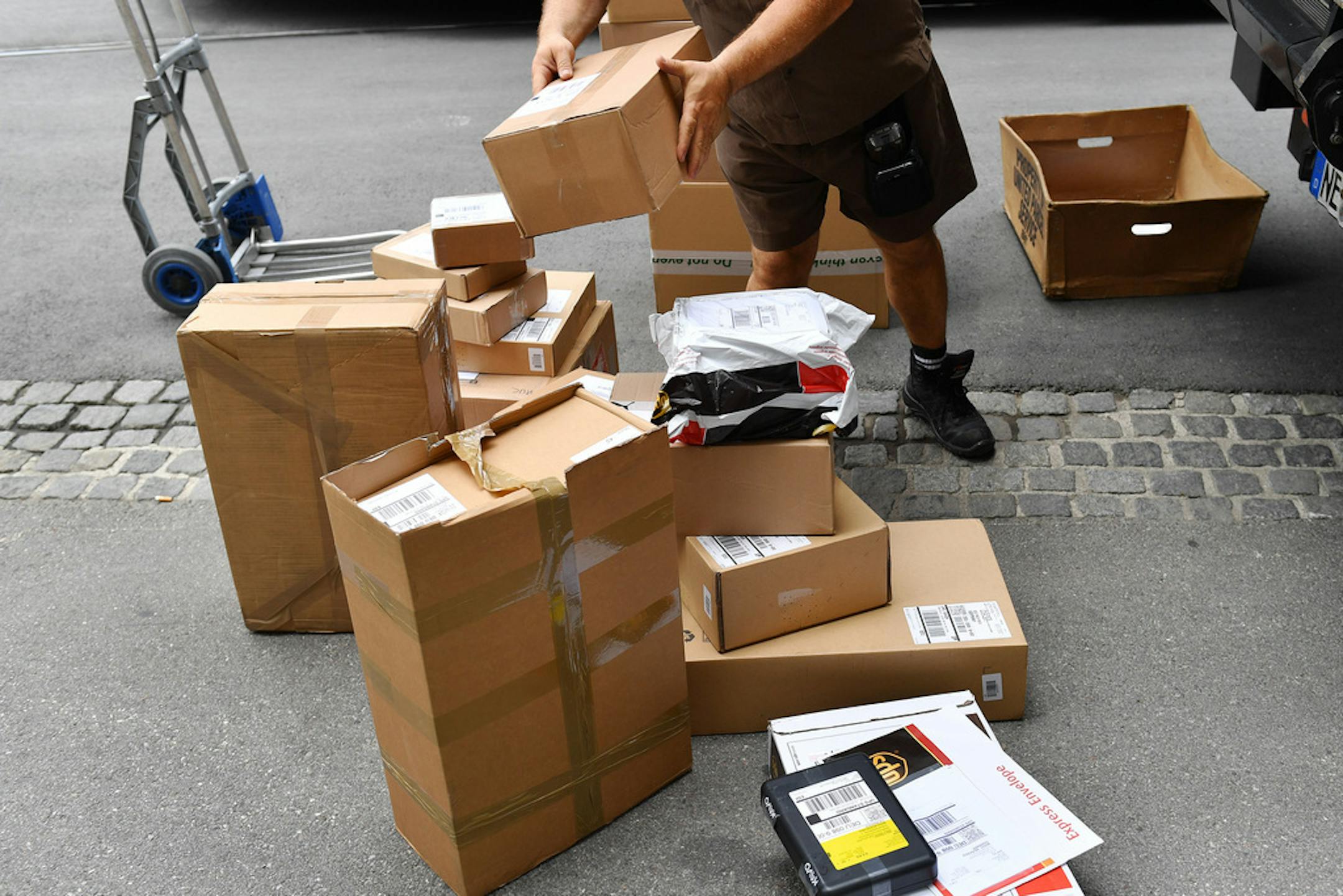 A UPS driver prepares to deliver packages in July 2019.