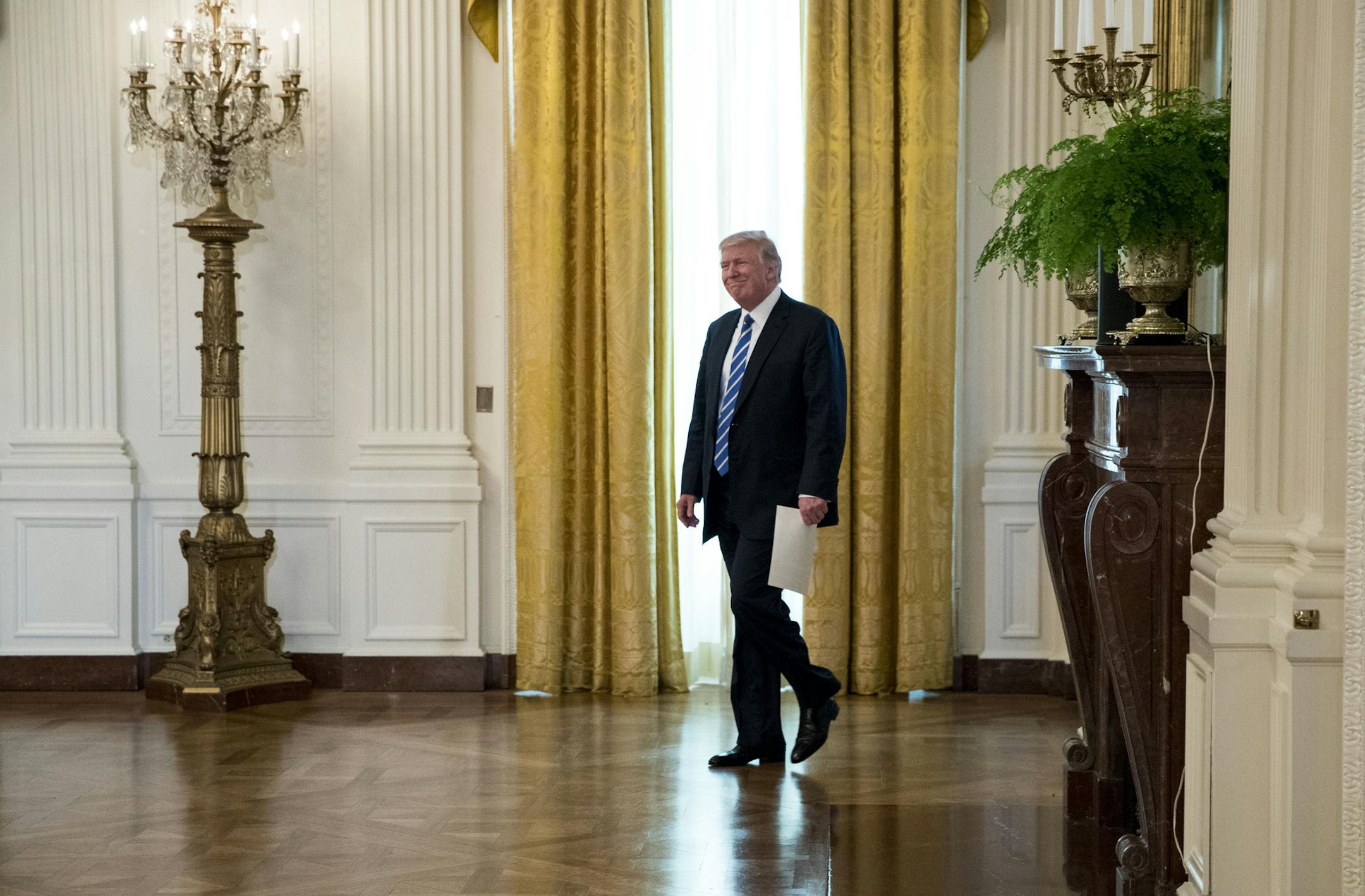 FILE — President Donald Trump arrives at a meeting with Republican lawmakers to discuss efforts to repeal and replace the Affordable Care Act, in the East Room of the White House in Washington, March 7, 2017. With questions still swirling over President Trump’s unsubstantiated claims that he was wiretapped on orders of President Barack Obama, the Justice Department on Thursday declined to confirm statements a day earlier from the White House that Trump was not the target of a count