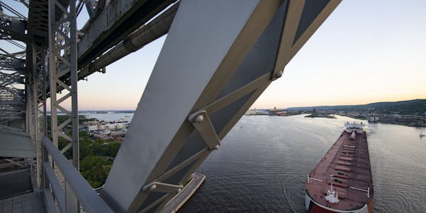 The Edwin H. Gott passes under the Aerial Lift Bridge in Duluth.