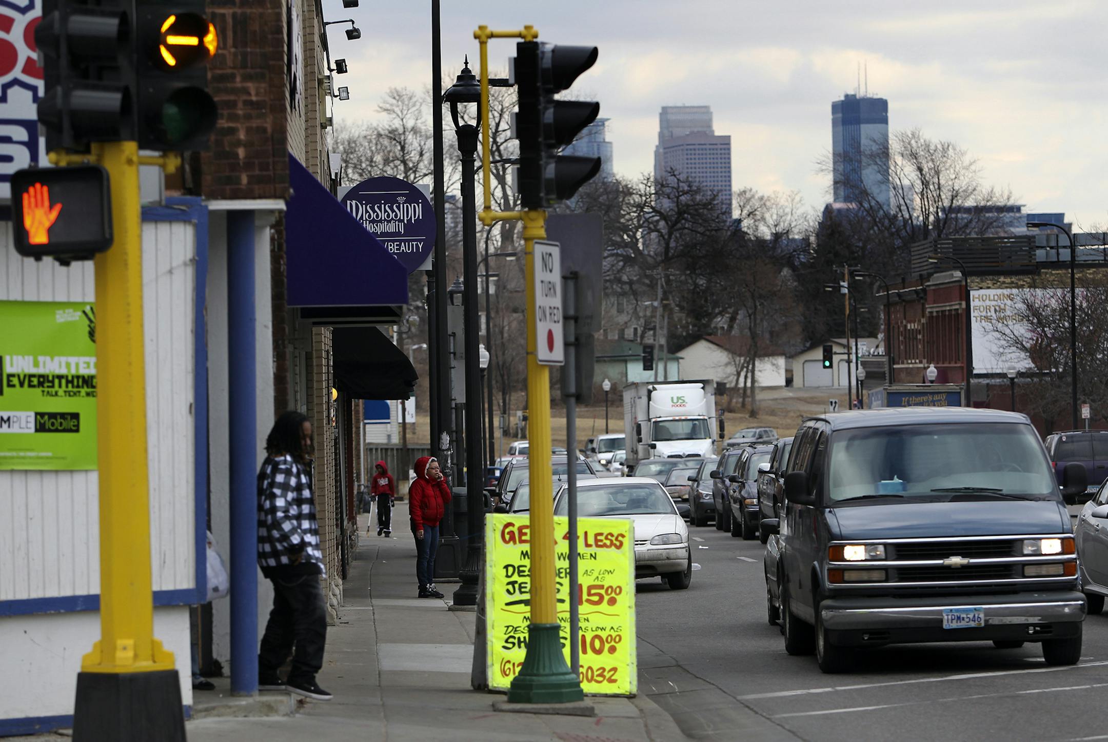 The Minneapolis city skyline is visible at the intersection of West Broadway Ave. and North Penn Ave. Friday, Feb. 17, 2012, in North Minneapolis, MN.] DAVID JOLES*djoles@startribune.com - City leaders are hoping to bring transit to North Minneapolis on the back of a county light rail project, spurring economic growth. In particular, some want to put streetcars along West Broadway. ORG XMIT: MIN2014081310551421