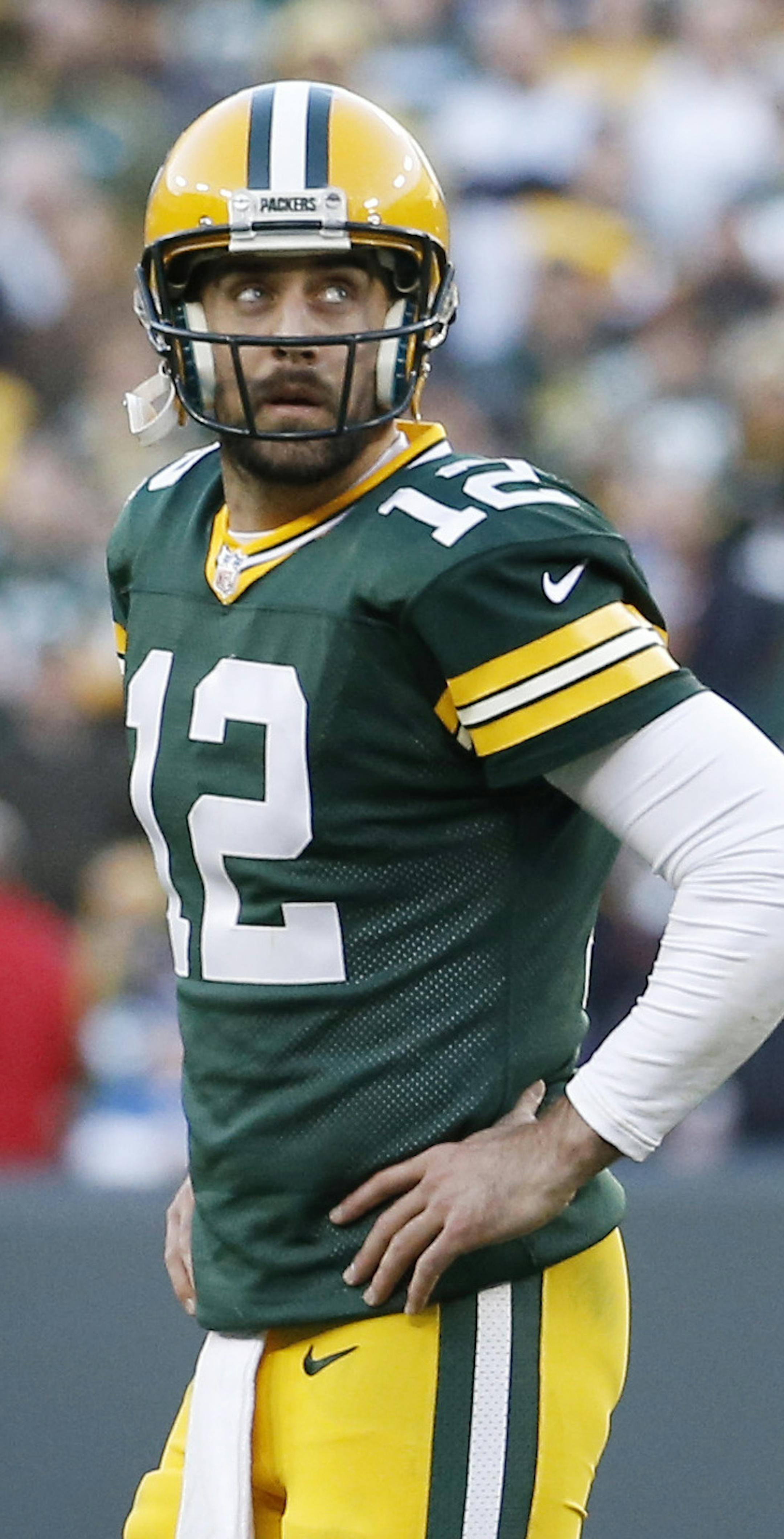 Green Bay Packers' Aaron Rodgers looks back as he walk off the field during the second half of an NFL football game against the Detroit Lions Sunday, Nov. 15, 2015, in Green Bay, Wis. The Lions won 18-16. (AP Photo/Morry Gash)