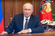 In this image made from a video released by the Russian Presidential Press Service, Russian President Vladimir Putin addresses the nation in Moscow, R