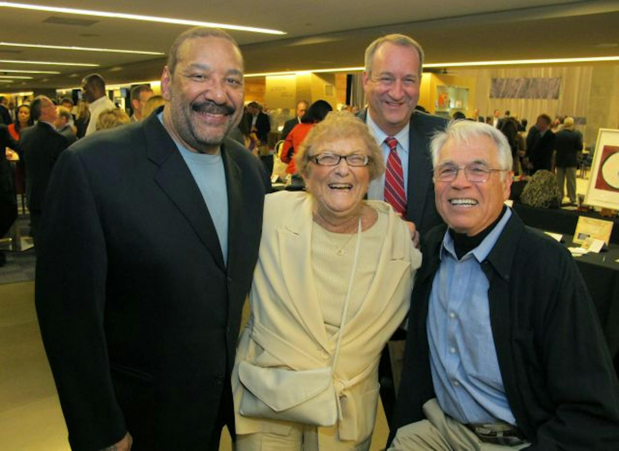 Jim Marshall, Doris Rosen and her son Mark Rosen of WCCO and Joe Kapp