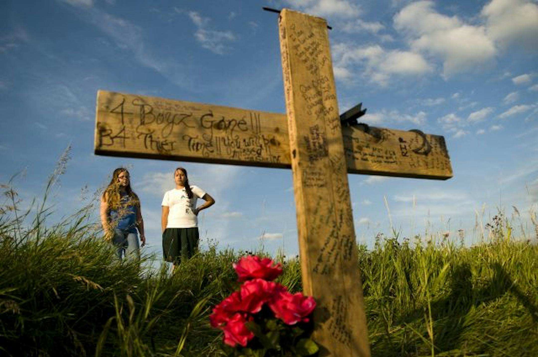 On Sunday, Alyssa Badten, 20, of St. James, Minn., and her cousin were among those visiting a makeshift memorial at the scene of a crash that killed four young men Saturday at a rural intersection north of Welcome, Minn. A fifth person in the car suffered critical injuries.