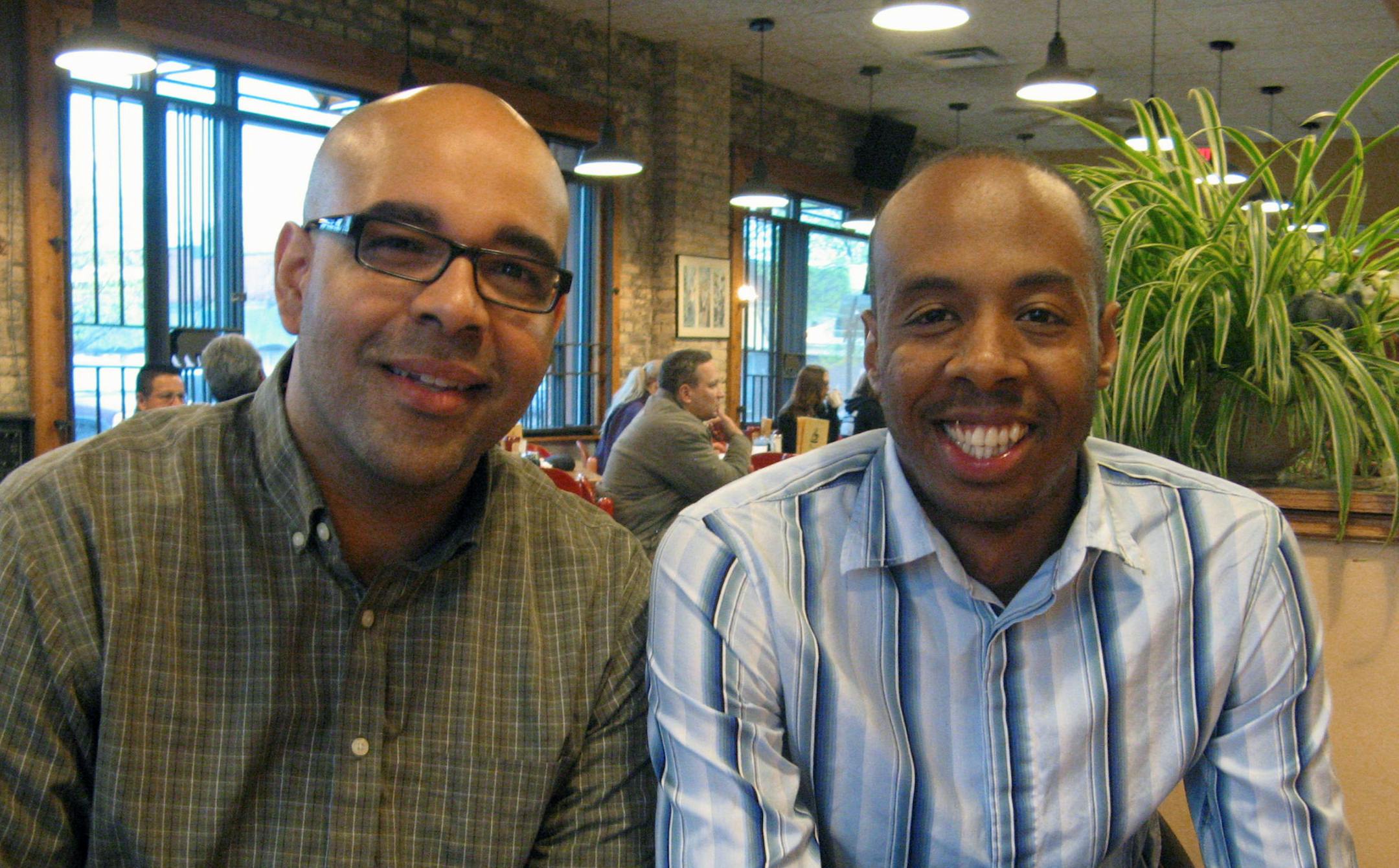 For TRACK060114: University of St. Thomas MBA graduates Vernon Rowland (glasses) and Pleasant Radford Jr.