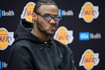 Former USC guard Bronny James takes questions from the media as he's introduced as a Los Angeles Lakers draft pick at a news conference in El Segundo,