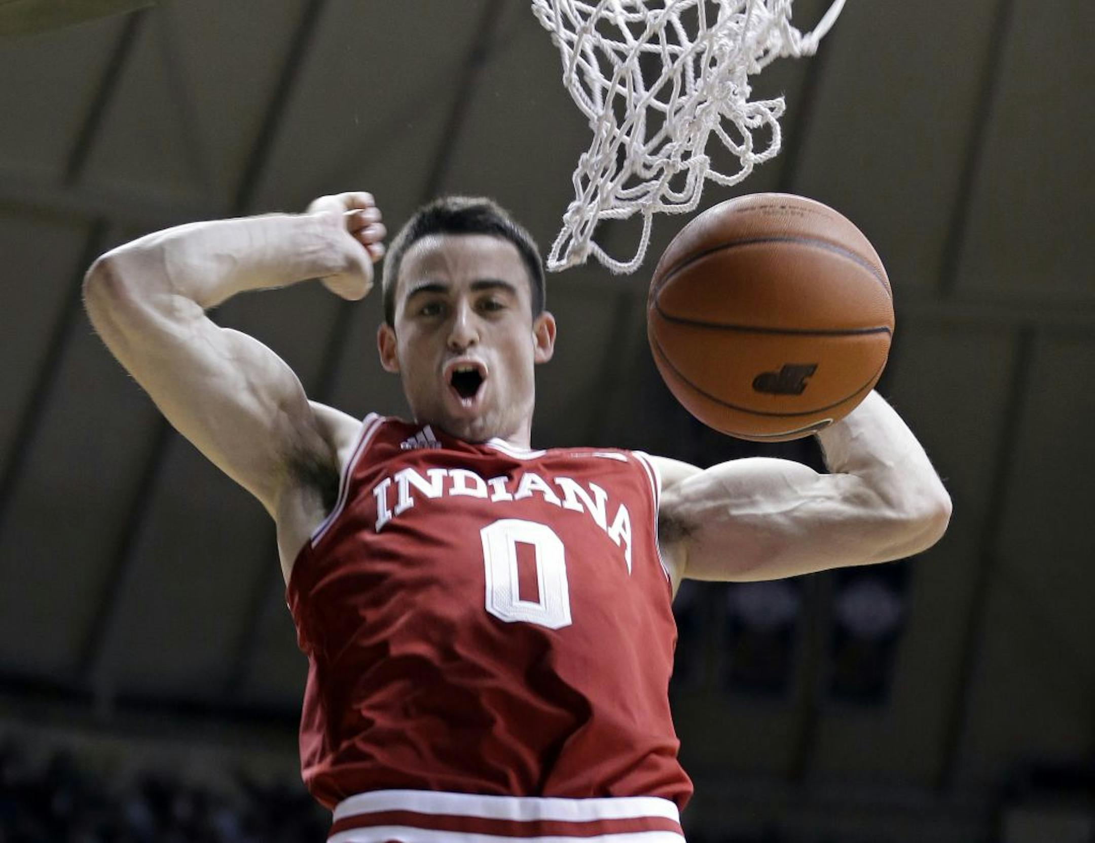 Indiana forward Will Sheehey celebrates his dunk against Purdue in the first half of an NCAA college basketball game in West Lafayette, Ind., Wednesday, Jan. 30, 2013.