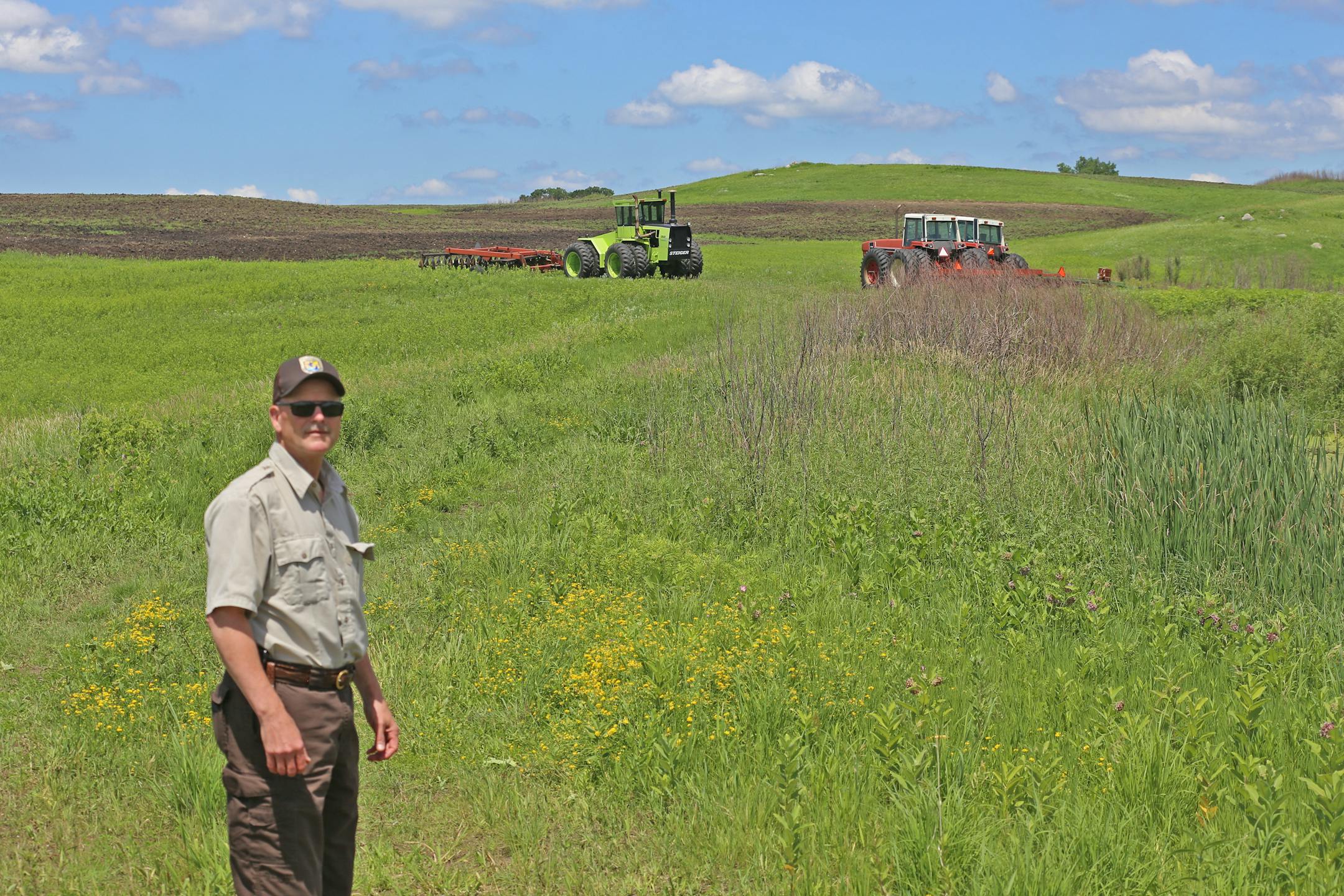 U.S. Fish and Wildlife Service Litchfield Wetland Management District project leader Scott Glup says habitat work in his seven-county region has been delayed due to the same heavy rains that have slowed crop planting.