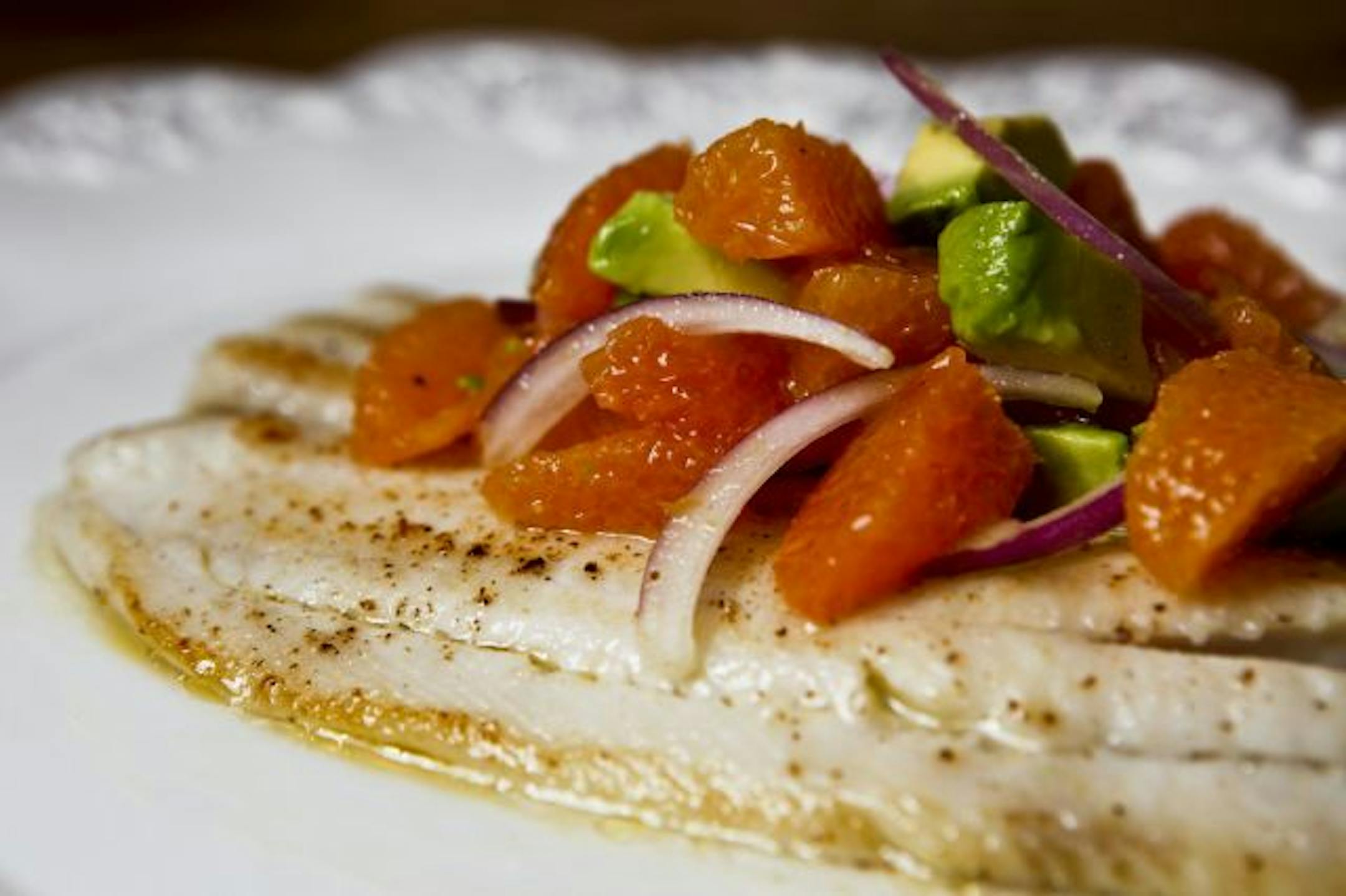Sole with Cara Cara orange, avocado and red onion salsa.