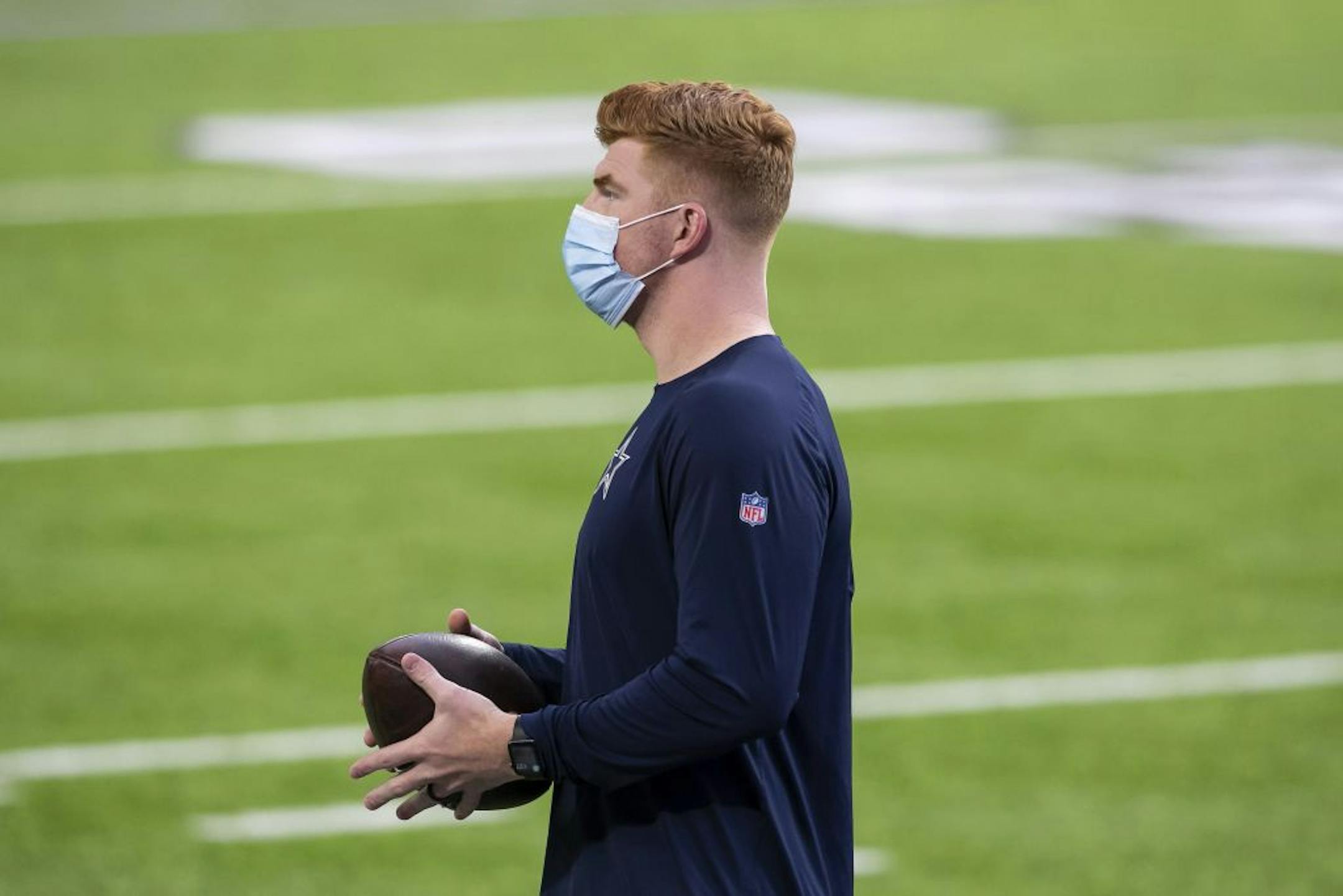 Dallas Cowboys quarterback Andy Dalton (14) looks on before the start of an NFL football game against the Minnesota Vikings, Sunday, Nov. 22, 2020, in Minneapolis.