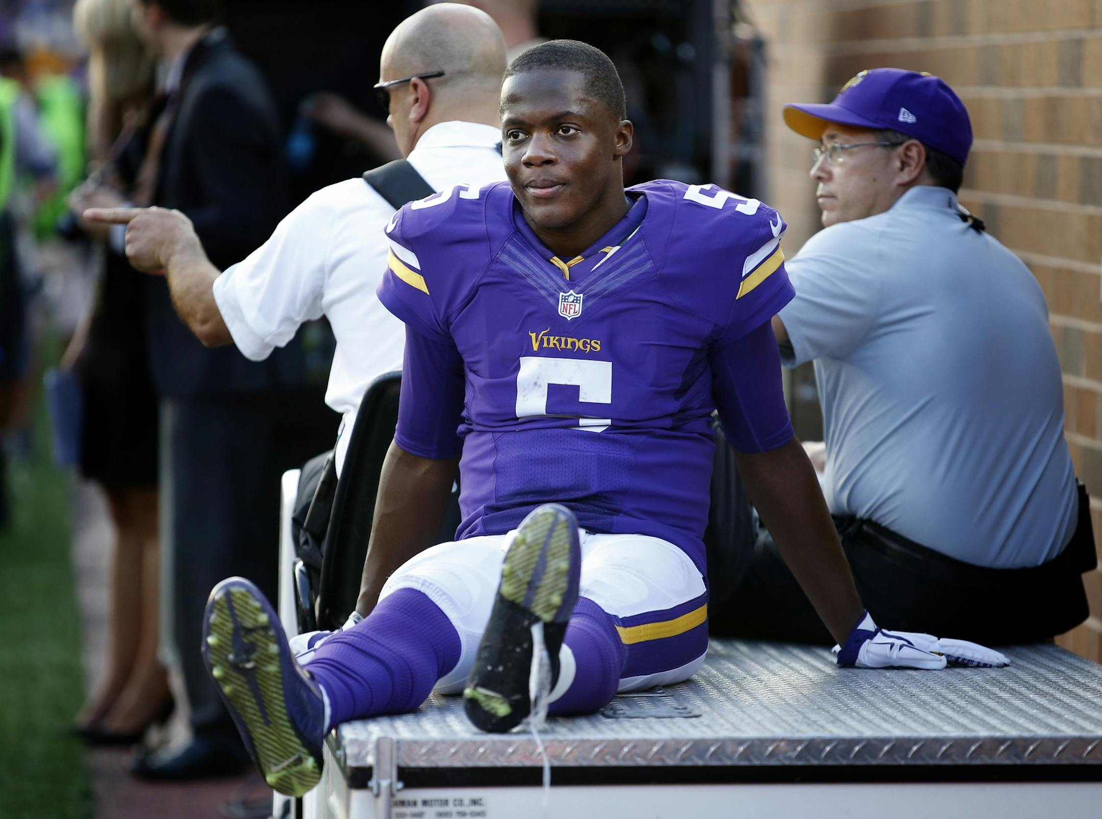 Minnesota Vikings rookie quarterback Teddy Bridgewater (5) was carted off the field in the fourth quarter. Minnesota beat Atlanta by a final score of 41-28.