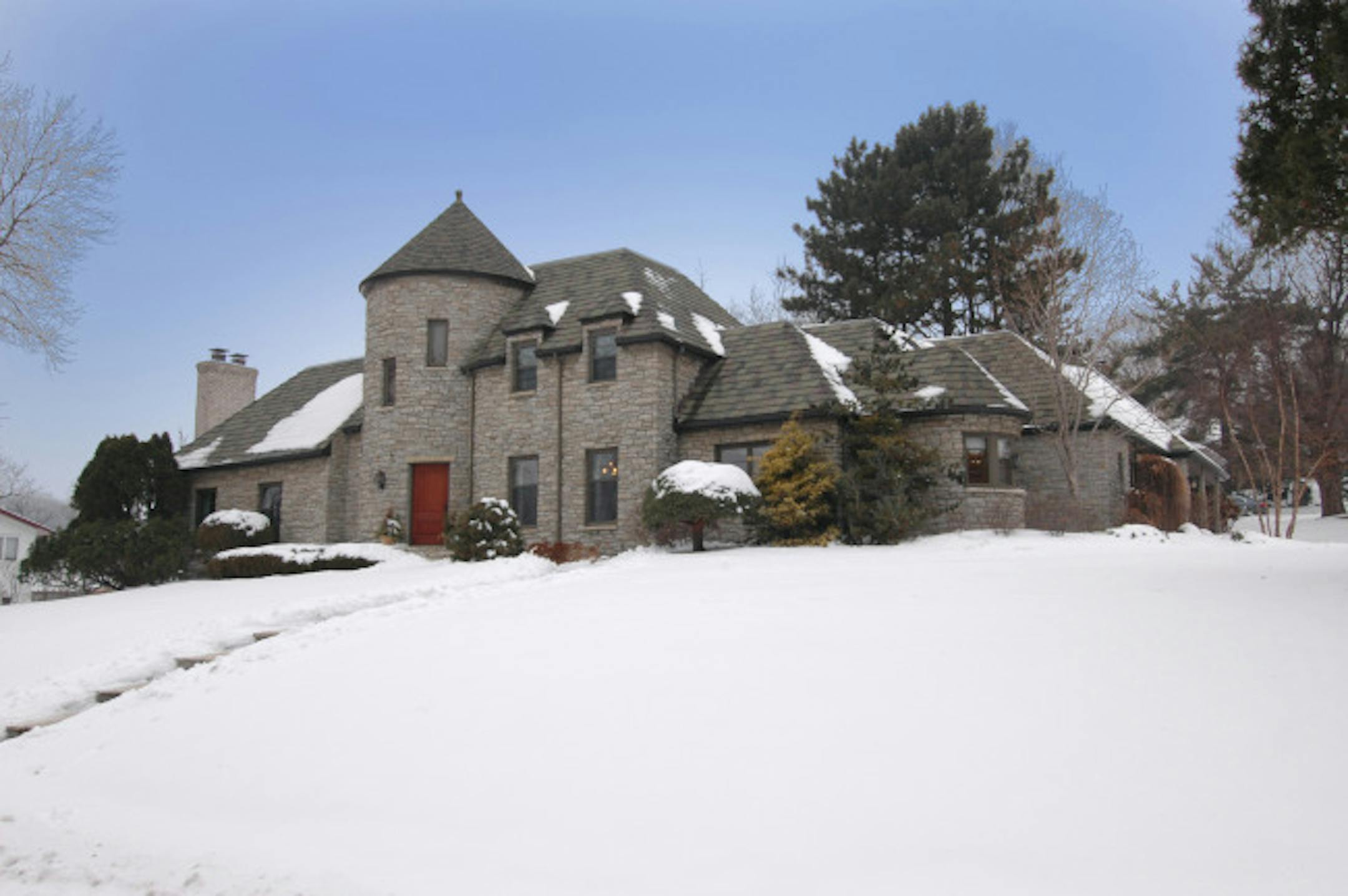 This 1940s mini-castle is a rarity in Minnesota because it's built entirely of stone.
