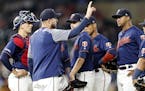 Minnesota Twins manager Rocco Baldelli (5), second from left, took out Minnesota Twins starting pitcher Jake Odorizzi (12), center, in the sixth innin
