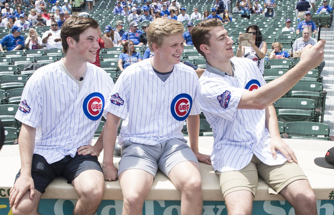 CHICAGO, IL - JUNE 21: Top 2017 NHL Draft prospects (left to right) Nolan Patrick, Casey Mittelstadt and Gabriel Vilardi take a selfie prior to a game between the San Diego Padres and the Chicago Cubs on June 21, 2017, at Wrigley Field, in Chicago, IL. (Photo by Patrick Gorski/Icon Sportswire) (Icon Sportswire via AP Images) ORG XMIT: 280277