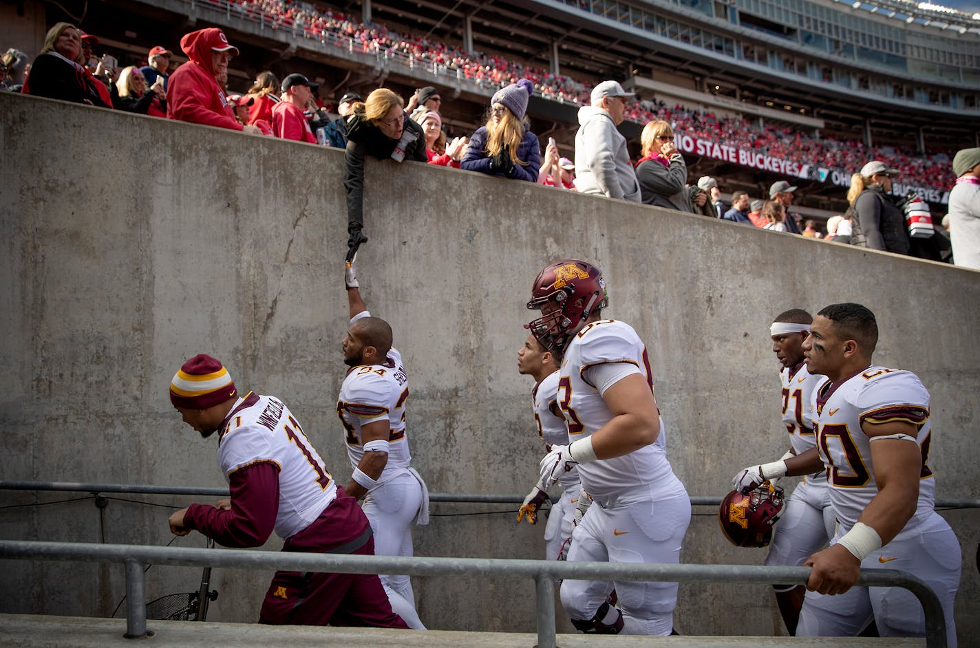 The Gophers headed off the field after losing to No. 3 Ohio State 30-14 at Ohio Stadium on Saturday.