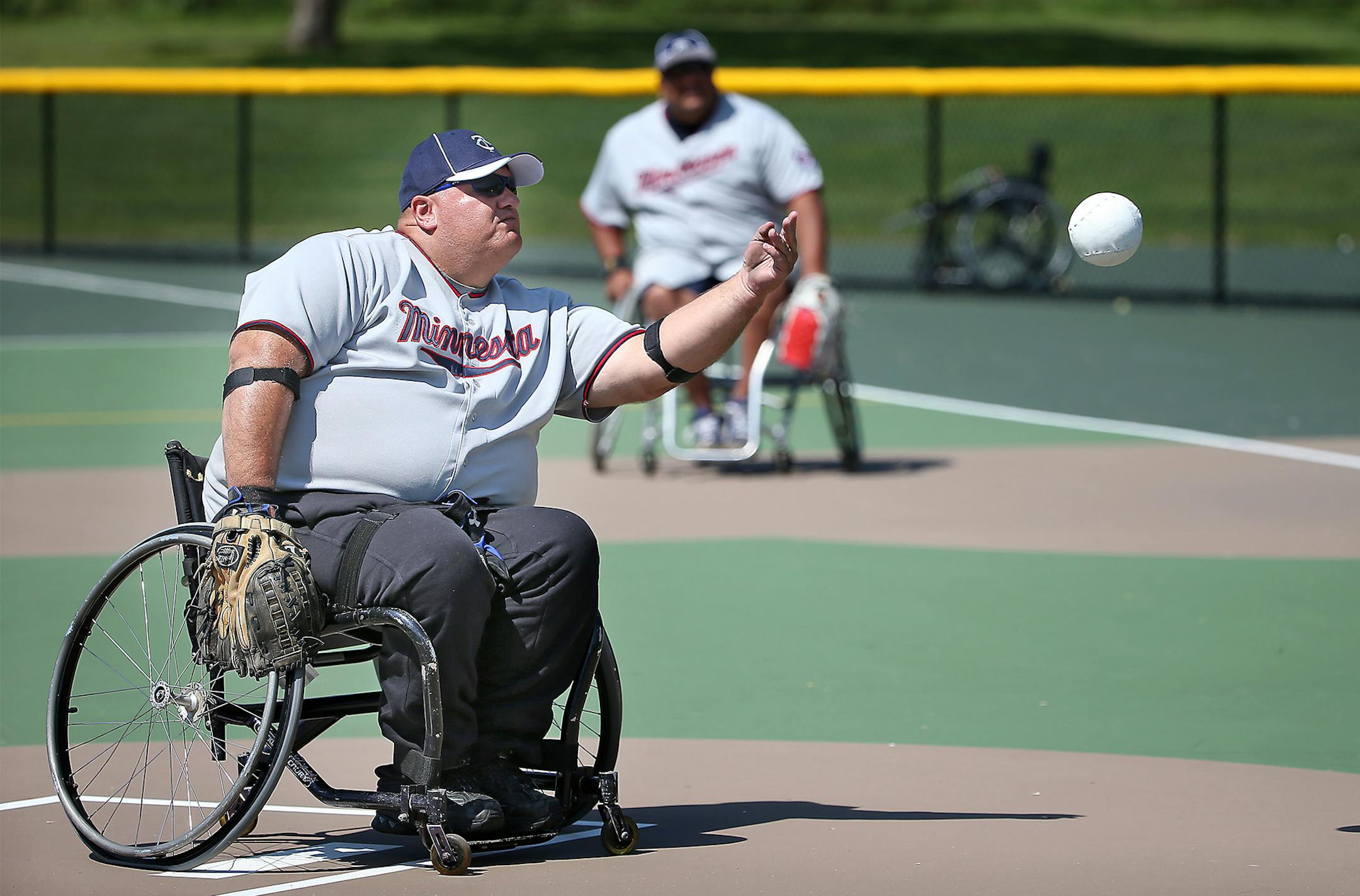 Minnesota Rolling Twins' Charlie Clausen pitched in the first inning against the New York Mets during the first round of play in the Wheelchair Softball World Series, Thursday, August 14, 2014. ] (ELIZABETH FLORES/STAR TRIBUNE) ELIZABETH FLORES • eflores@startribune.com
