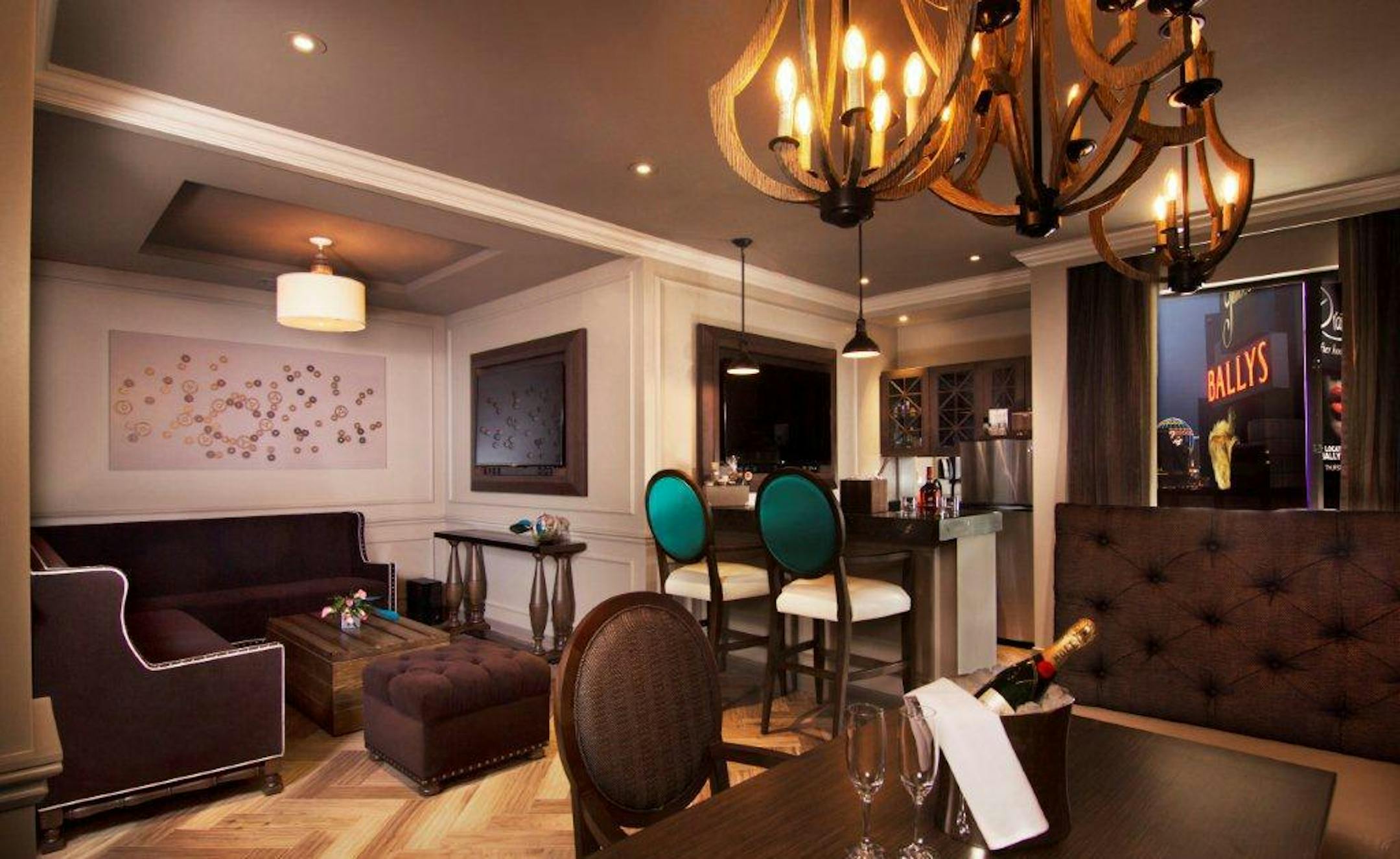 This undated image provided by Caesars Entertainment shows an interior view of a room at The Cromwell Hotel-Casino in Las Vegas. Managers of The Cromwell hope to impress guests not with an imposing tower, but with unexpected details such as in-room hair straighteners and backgammon boards and free, self-serve coffee stations in the elevator lobby of each floor. (AP Photo/Caesars Entertainment)