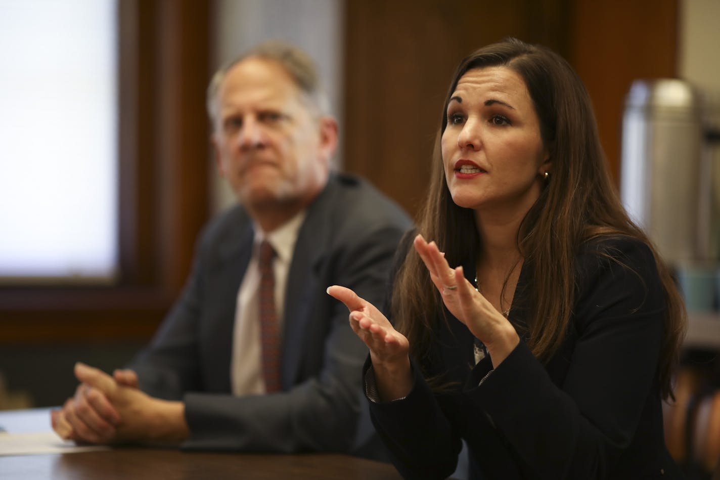 Attorneys Heather Gilbert, foreground, and Roderick Macpherson III both spoke at the news conference. ] JEFF WHEELER &#xef; jeff.wheeler@startribune.com A settlement has been reached in the cases of several deaf inmates who said they were treated poorly in four county jails. They weren't provided with interpreters, and didn't provide them access to phones or equal communication for announcements. Lawyers and three men who brought complaints were present at a news conference at the Charles Thomps