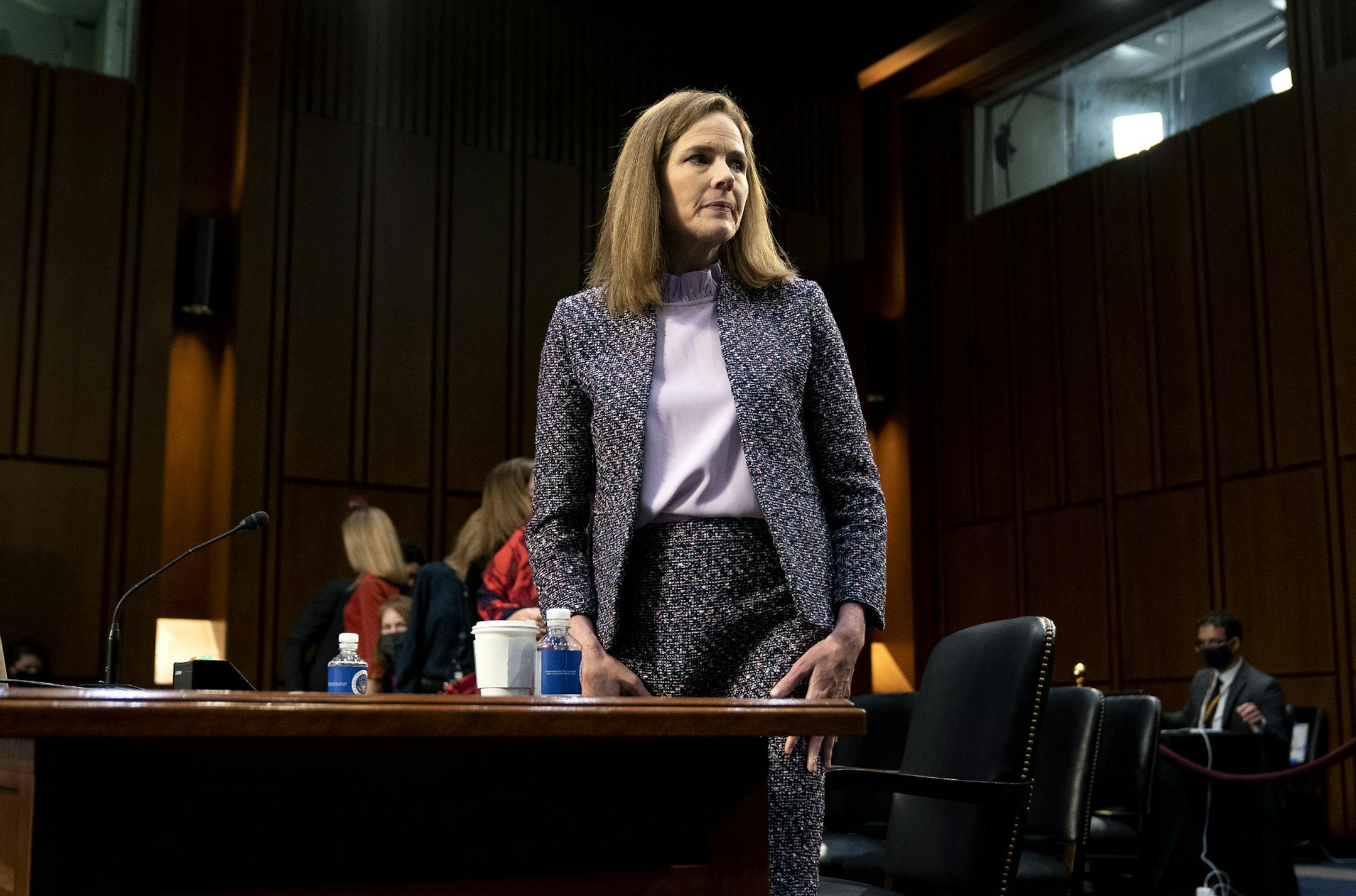 Supreme Court nominee Amy Coney Barrett departs during a break in a confirmation hearing before the Senate Judiciary Committee, Wednesday, Oct. 14, 2020, on Capitol Hill in Washington. (Stefani Reynolds/Pool via AP)