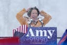 Sen. Amy Klobuchar wiped snow from her hair after announcing she is running for President of the United States Sunday afternoon.