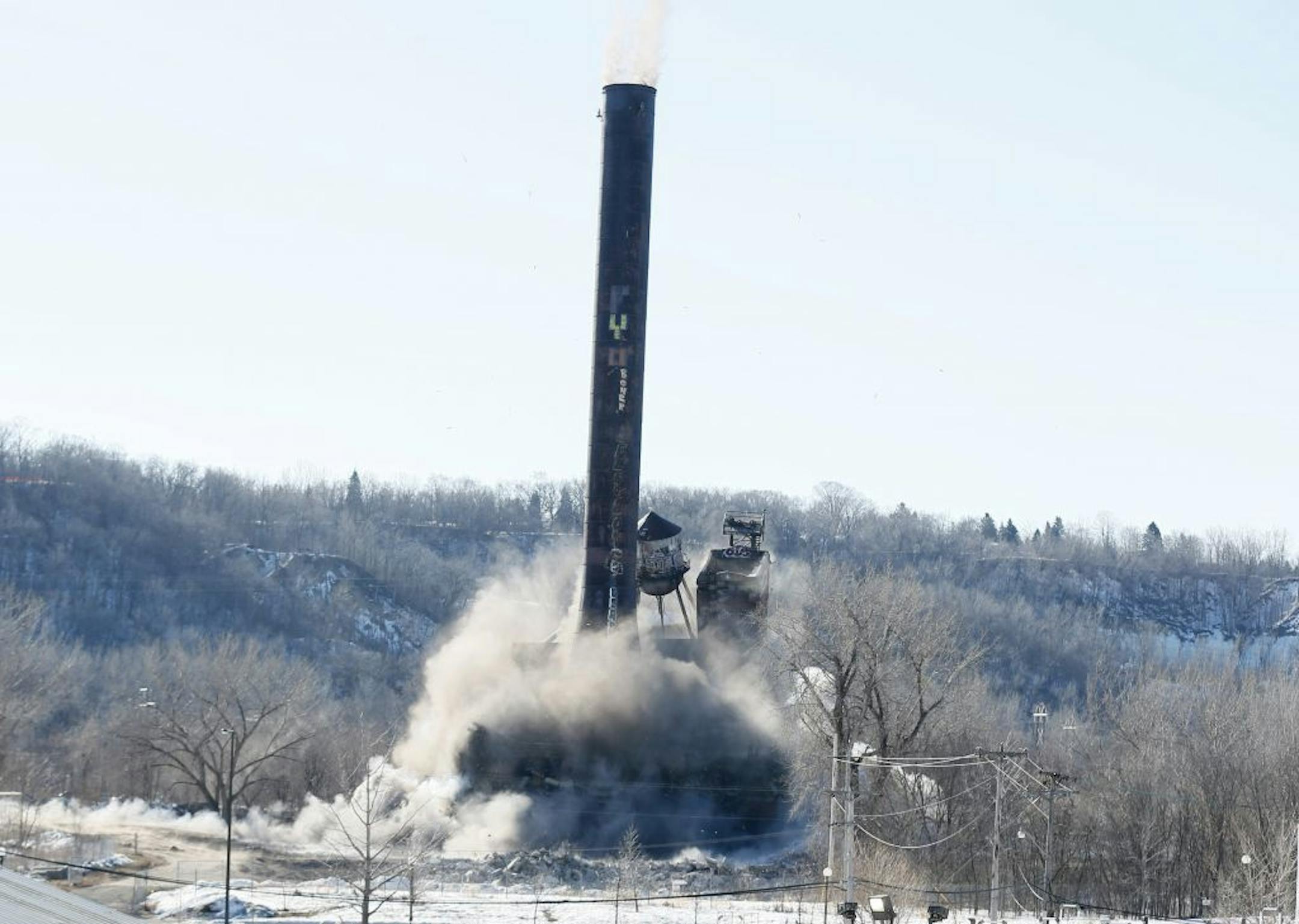 A St. Paul landmark was brought down with a blast on Sunday morning March 16, 2014. A coal-fired power plant on the Mississippi River, upstream from downtown St. Paul. The 10-story building was topped by a 180-foot smokestack. The blast was at 10 a.m. Sunday. in St. Paul, MN.