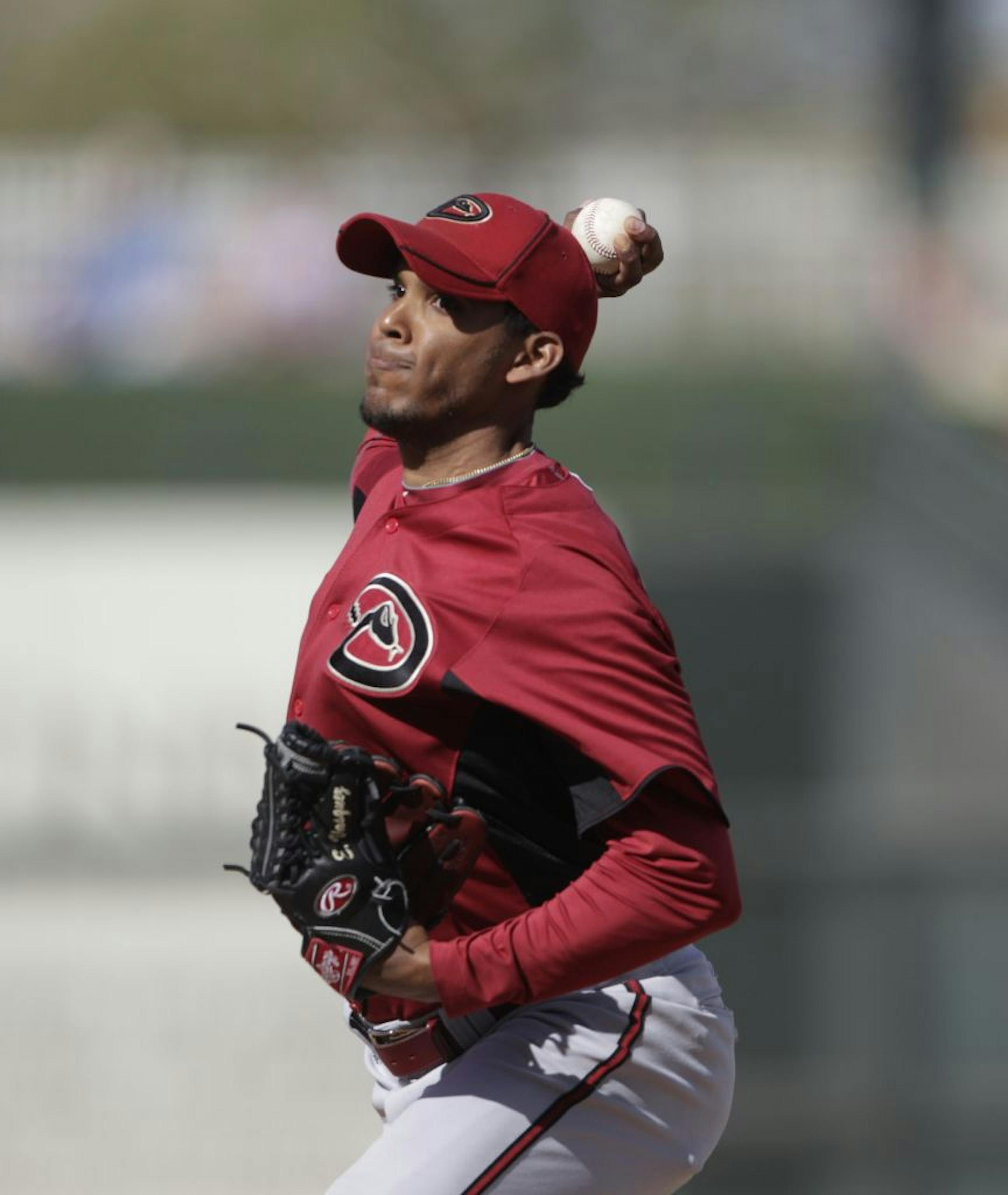 Arizona Diamondbacks relief pitcher Esmerling Vasquez during a spring training baseball game in Surprise, Ariz., Monday, March 7, 2011. (AP Photo/Lenny Ignelzi