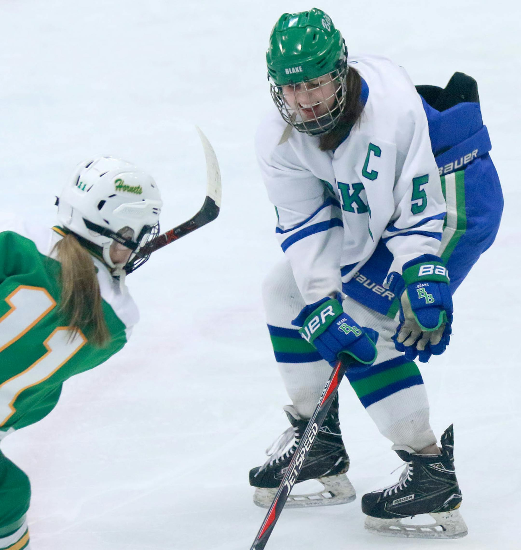 Blake defender Madeline Wethington (5) goes down to block a shot by Edina's Annie Kuehl (11) during the second period of the Girls' hockey, Class 2A, Section 6 final Friday, Feb. 15, 2019, at Parade Ice Garden in Minneapolis, MN. Edina won 3-2.] DAVID JOLES •david.joles@startribune.com Girls' hockey, Class 2A, Section 6 final