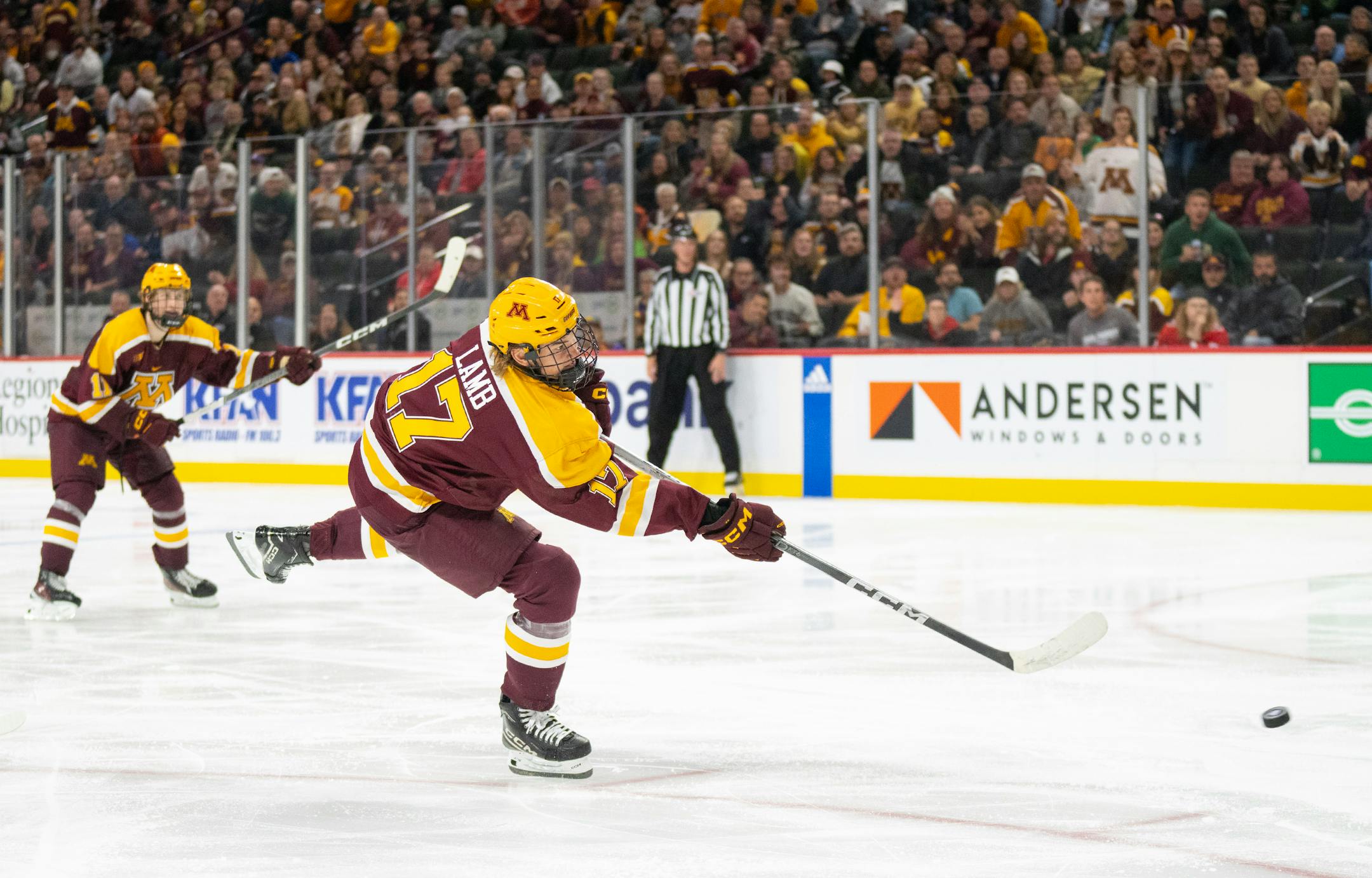 Minnesota forward Brody Lamb (17) scores a goal to tie the game 4-4 against St. Thomas in the third period Friday, Oct. 13, 2023, at Xcel Energy Arena in St. Paul, Minn. ]