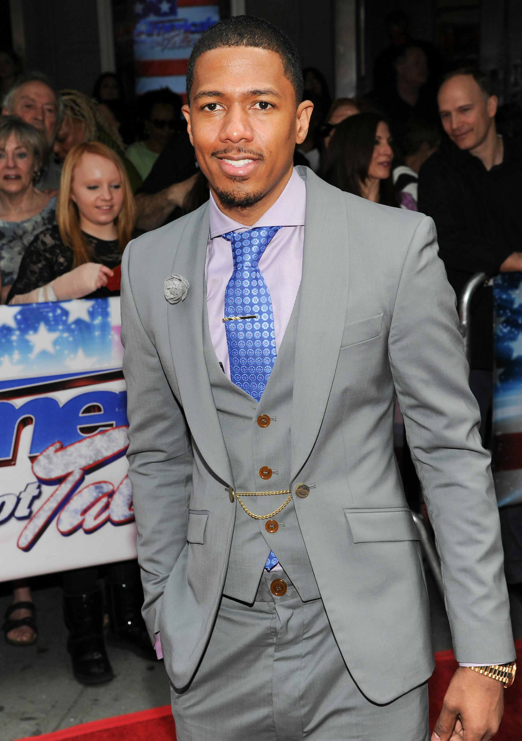 Host Nick Cannon arrives at the "America's Got Talent" auditions on Tuesday April 9, 2013 in New York. (Photo by Evan Agostini/Invision/AP) ORG XMIT: MIN2013050614415242
