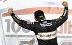 Aric Almirola celebrated in Victory Lane after winning the 1000Bulbs.com 500 NASCAR Cup Series race at Talladega Superspeedway on Sunday.