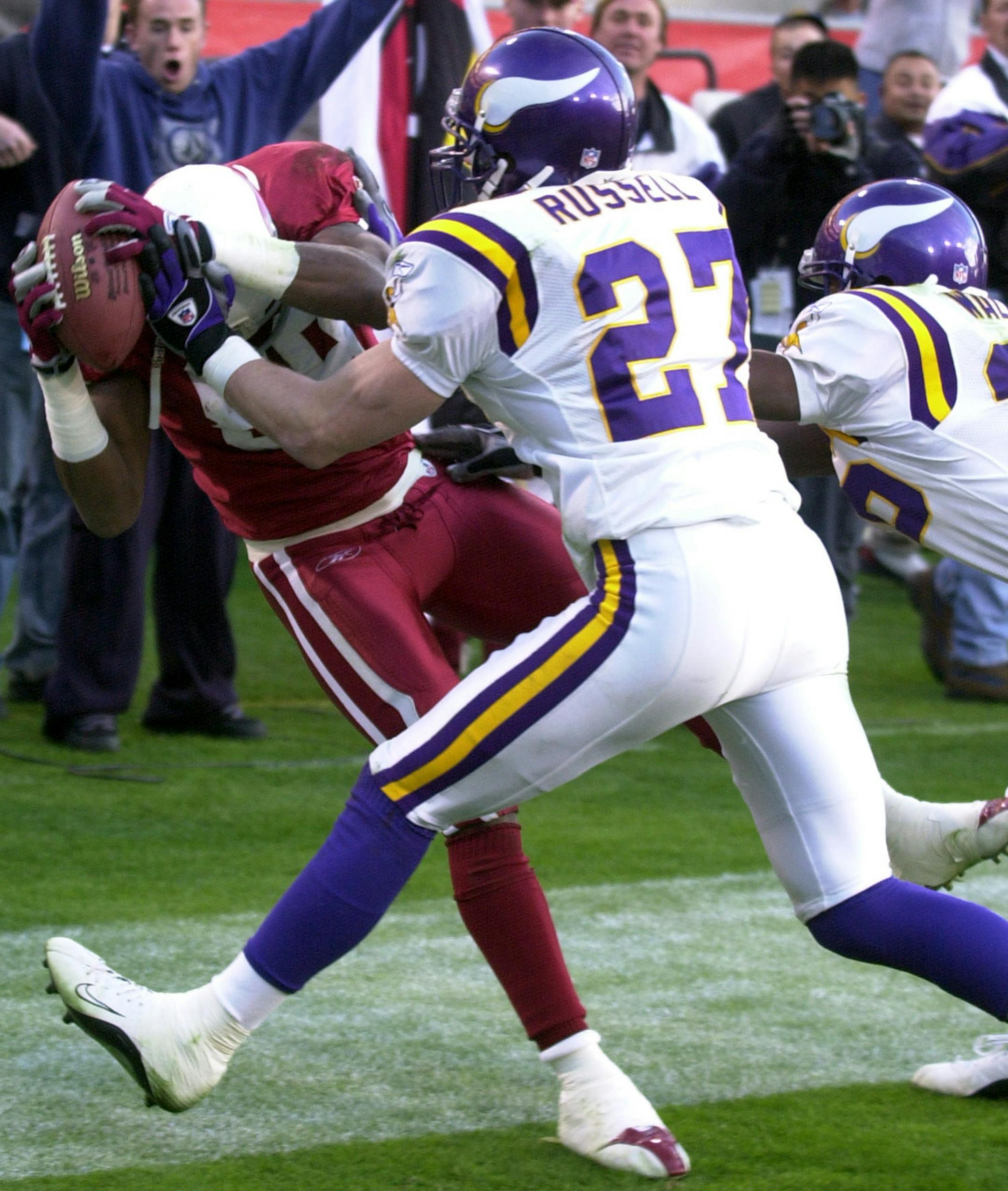 Arizona Cardinals receiver Nate Poole (84) catches a touchdown pass against the Minnesota Vikings during an NFL football game, Sunday, Dec. 28, 2003, in Phoenix, Ariz. (AP Photo/Paul Connors) ORG XMIT: PNP119