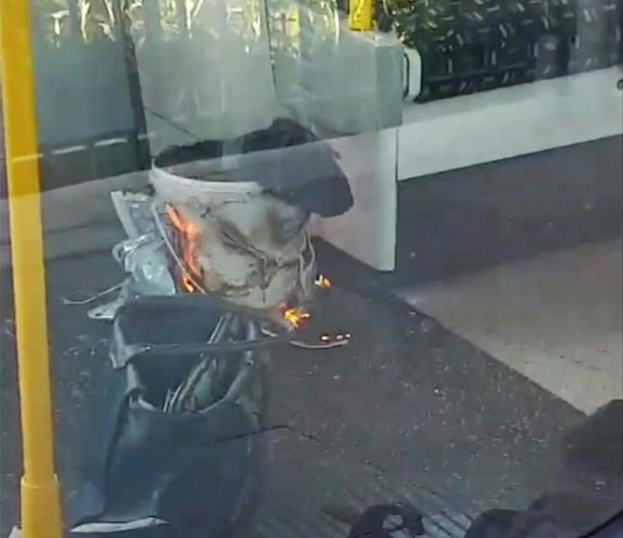This is an image made from video showing burning items in underground train at the scene of an explosion in London Friday, Sept. 15, 2017.