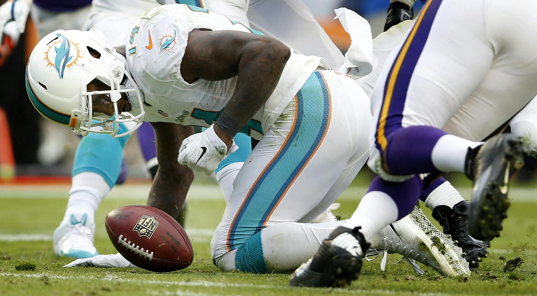 Jarvis Landry (14) fumbled a kickoff that was recovered by Antone Exum Jr. in the fourth quarter. ] CARLOS GONZALEZ cgonzalez@startribune.com - December 21, 2014, Miami Gardens, FL, Sun Life Stadium, NFL, Minnesota Vikings vs. Miami Dolphins