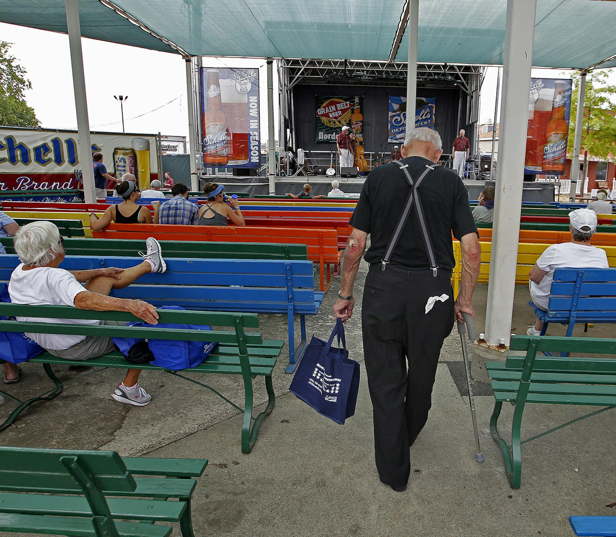 Visitors made their way into the Heritage Square stage for a concert by The Barbary Coast Dixieland Show Band at the Minnesota State Fair, Tuesday, August 27, 2013 in Falcon Heights, MN. After nearly 50 years and changing priorities, the State Fair's Heritage Square, tucked in a sleepy corner wrapped in nostalgia, is going to be overtaken as a transit hub. (ELIZABETH FLORES/STAR TRIBUNE) ELIZABETH FLORES &#x2022; eflores@startribune.com