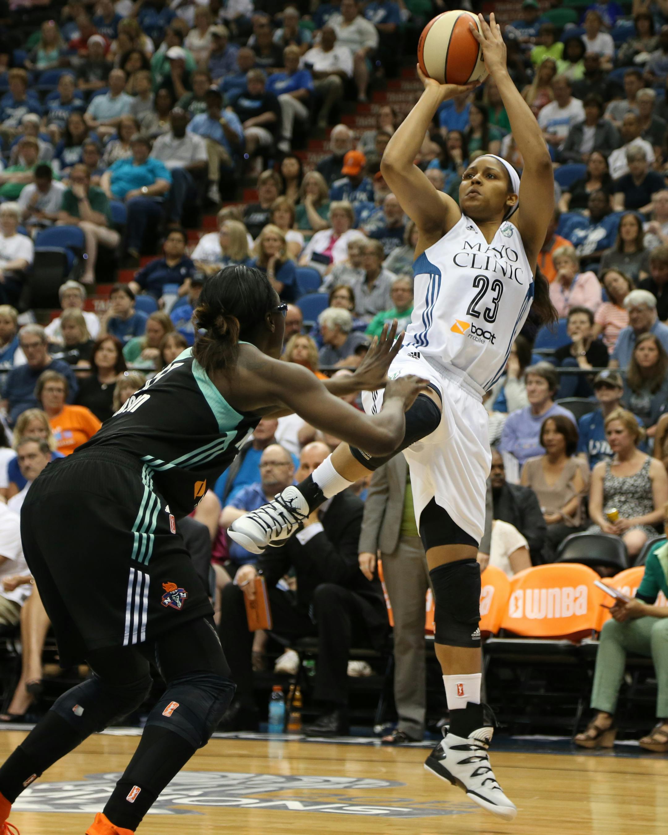 Lynx Maya Moore shot over the top of Liberty's Essence Carson during the first half. ] (KYNDELL HARKNESS/STAR TRIBUNE) kyndell.harkness@startribune.com Lynx vs New York Liberty at the Target Center in Minneapolis Min. Saturday, May 24, 2014.