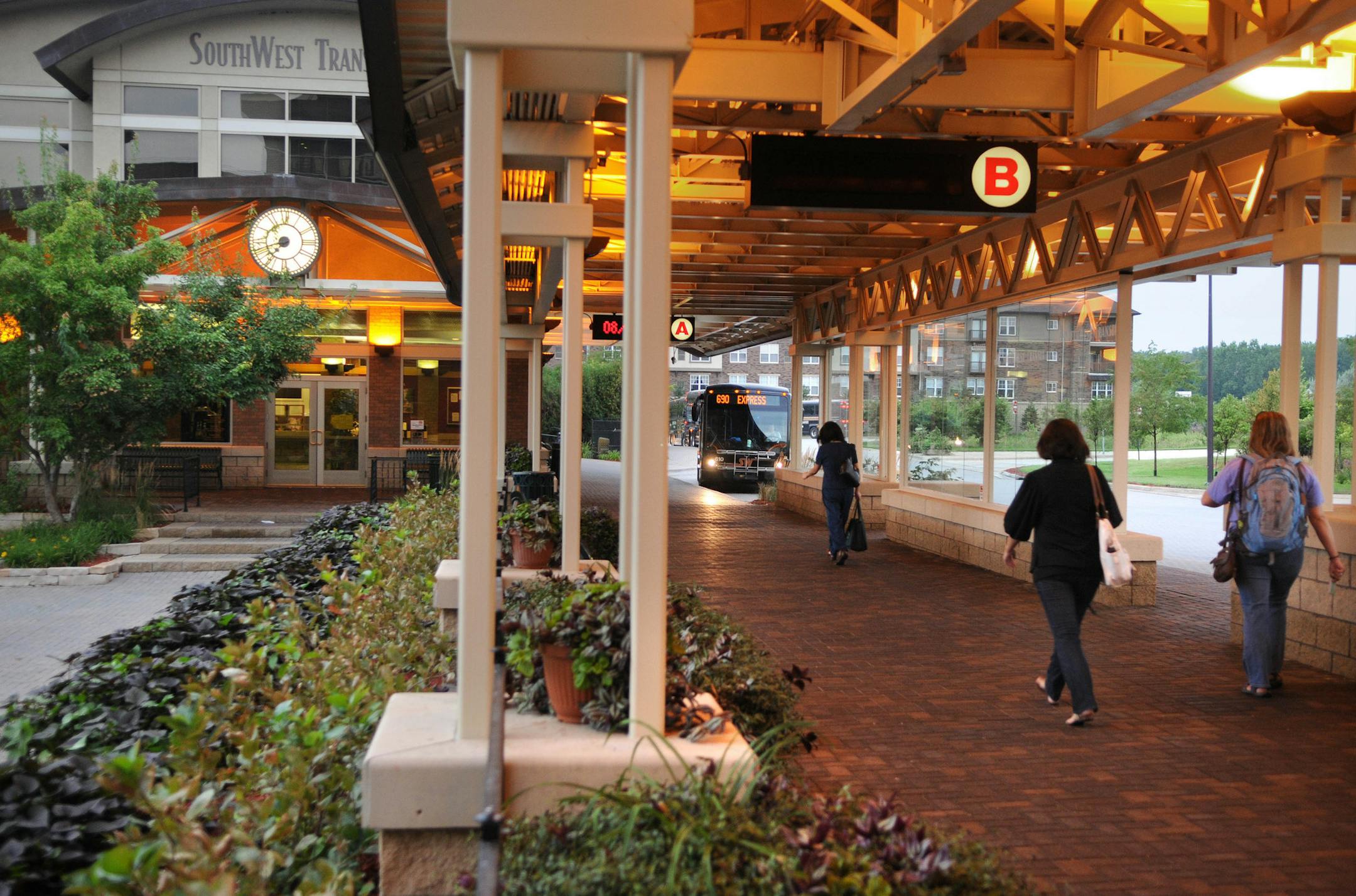 Richard Sennott&#xac;&#x2022;rsennott@startribune.com] Thursday 8/19/10 Eden Prairie Lori York takes both the SouthWest fancy coaches starting from Eden Prairie's gorgeous station, and then transfers to city buses downtown to reach her job at Augsburg. IN THIS PHOTO:] SouthWest Transit bus station ORG XMIT: MIN2013122612254236