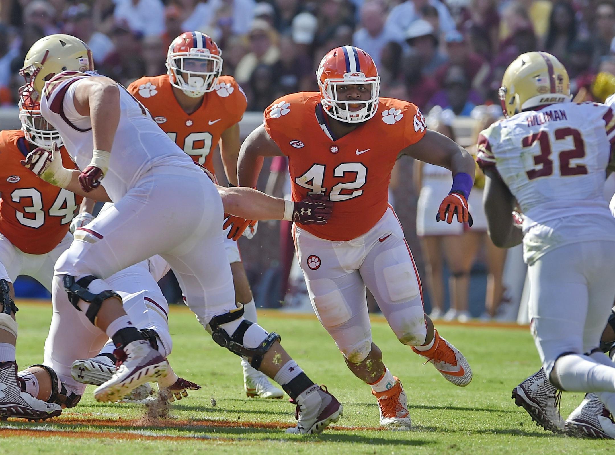 FILE - In this Sept. 23, 2017, file photo, Clemson's Christian Wilkins (42) defends during the first half of an NCAA college football game against Boston College, in Clemson, S.C. Wilkins was selected to the AP Preseason All-America team, Tuesday, Aug. 21, 2018. (AP Photo/Richard Shiro, File)
