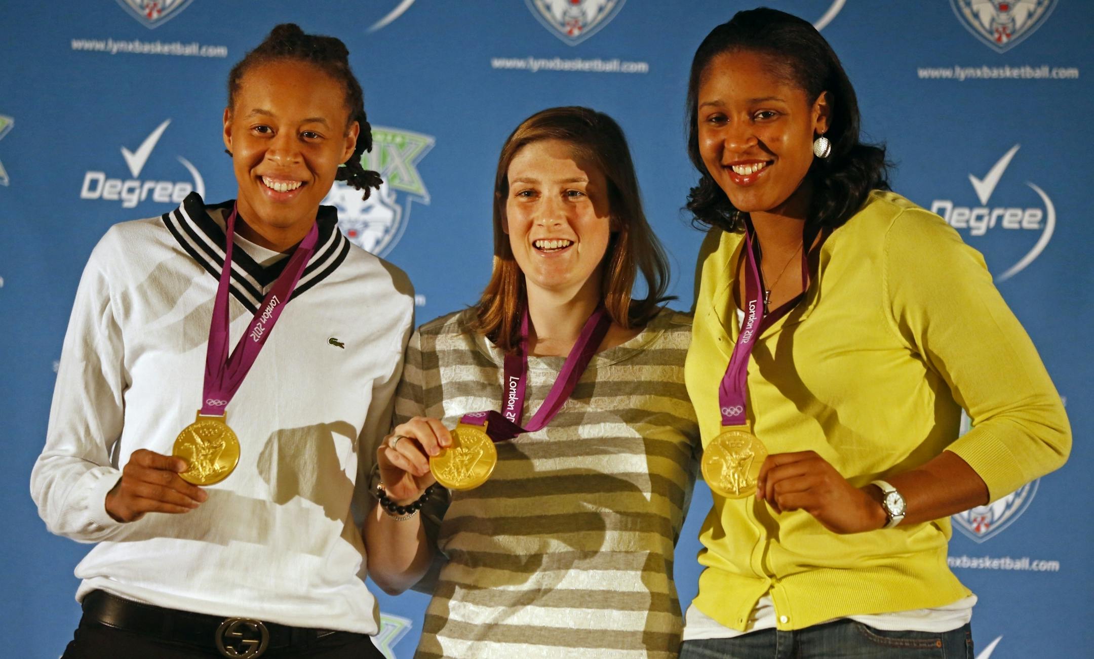 At Target Center, Lynx Olympians Seimone Augustus, Lindsay Whalen, and Maya Moore recounted their Olympic experience and showed off their basketball gold medals.