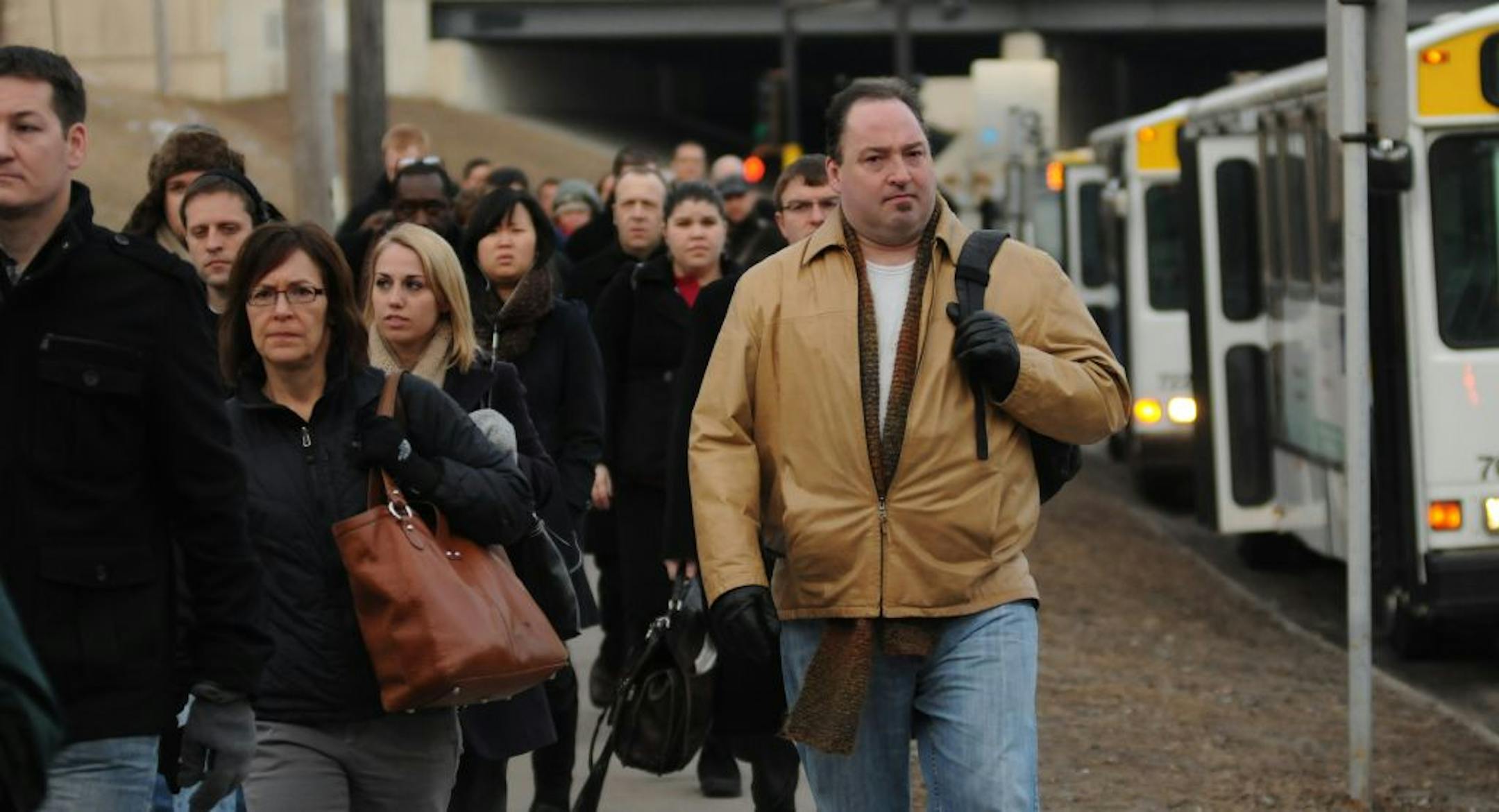 These commuters didn't abandon light rail for their cars when a ­pedestrian bridge failure forced them to take a bus detour.