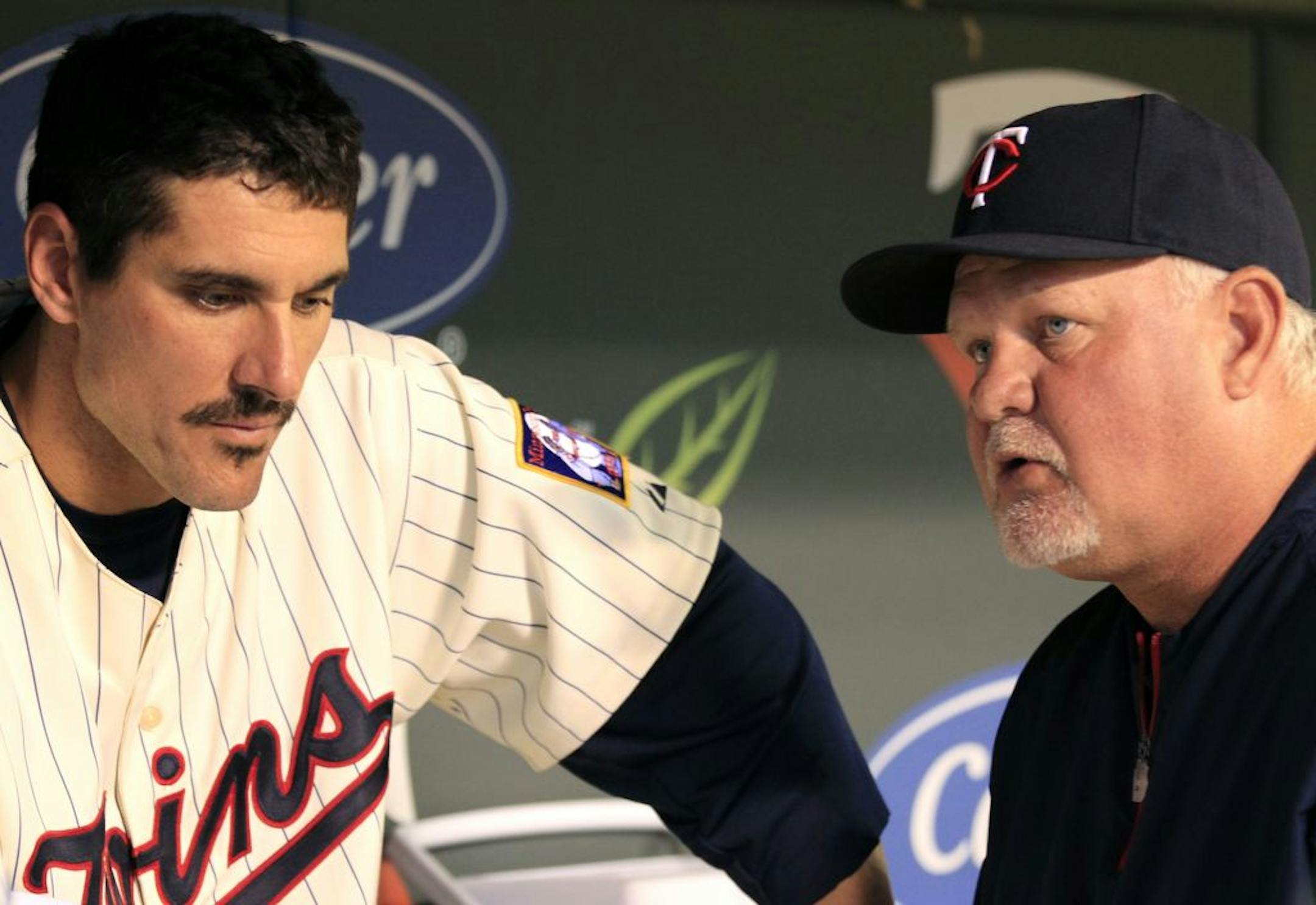 Manager Ron Gardenhire and Carl Pavano