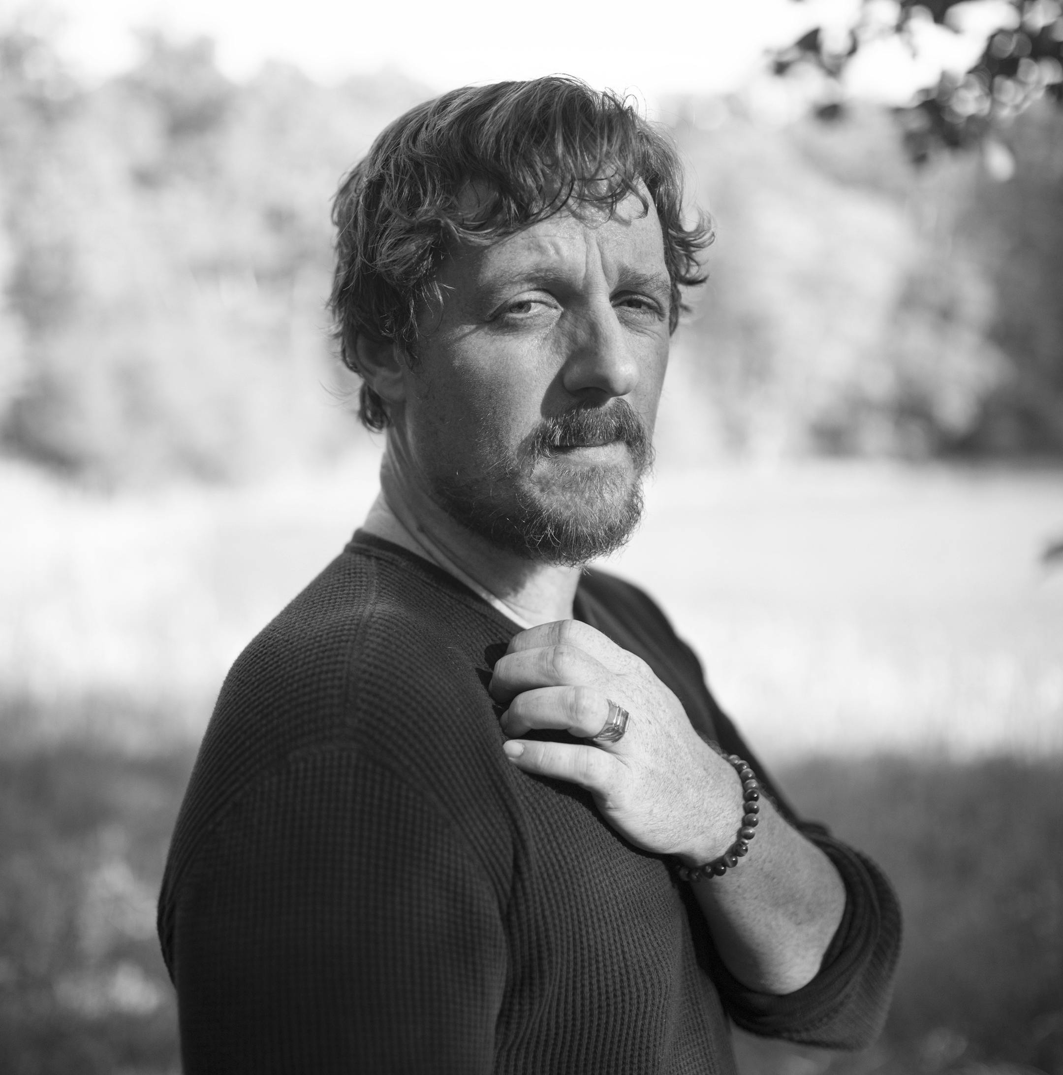 Singer Sturgill Simpson, the Nashville disrupter who won a Grammy Award for his 2016 album, “A Sailor’s Guide to Earth,” on his property in Sewanee, Tenn., Sept. 12, 2019. Simpson, whose new album, “Sound & Fury” debuts Sept. 27, 2019, refuses to be what others want him to be. (Kristine Potter/The New York Times)