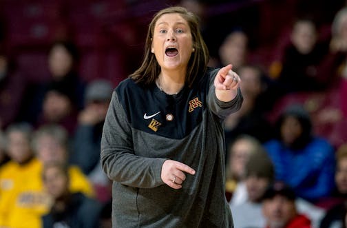 Minnesota head coach Lindsay Whalen shouts from the sideline during the second quarter of an NCAA college basketball game against Western Illinois Monday, Nov. 7, 2022, in Minneapolis, Minn. (Carlos Gonzalez/Star Tribune via AP)