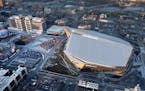 This overhead view is the reason why the Minnesota Vikings want to stop Wells Fargo from putting up mounted, illuminated signs on the rooftops of its 