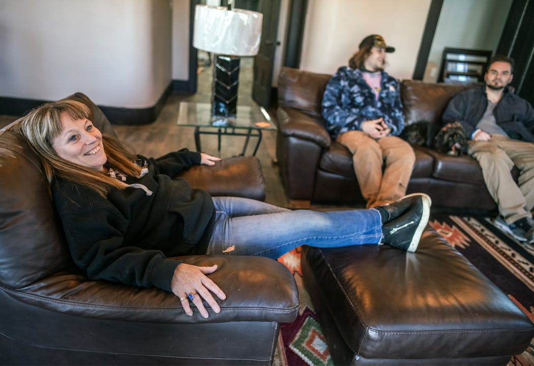 House manager Shanni Fladebo tested out a couch just set up in the living room of the Ranch.