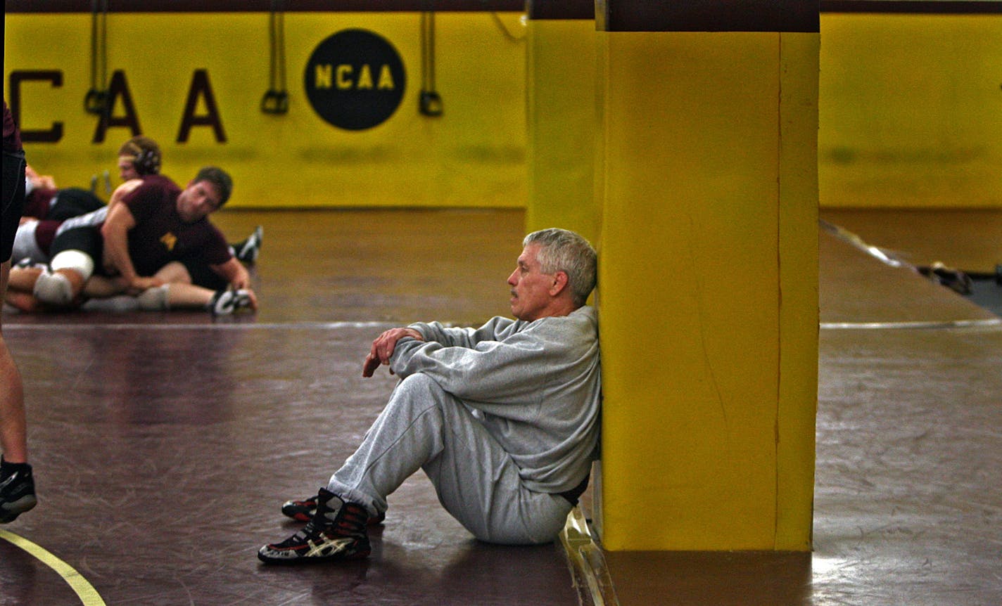 J Robinson watched a practice during his tenure as head coach of the University of Minnesota wrestling team. He now runs a summer camp at the University of Wisconsin campus in River Falls.