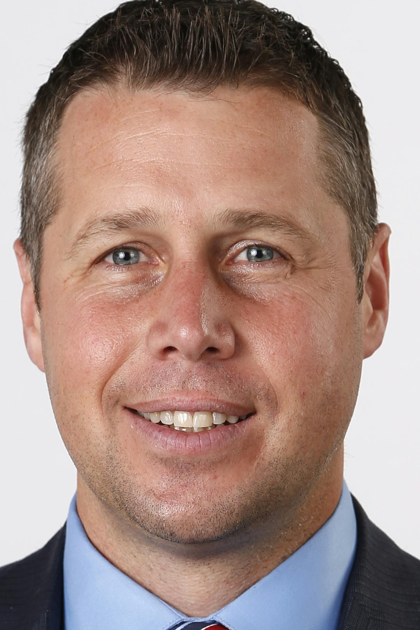 In this Sept. 29, 2014 photo, Memphis Grizzlies head coach David Joerger poses for a photo during the team's NBA basketball media day in Memphis, Tenn. (AP Photo/Mark Humphrey) ORG XMIT: NYOTK