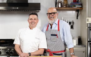 Chefs Gavin Kaysen, left, and Andrew Zimmern are partners in KZ Provisioning, which helps Minnesota's professional sports teams change the way they th