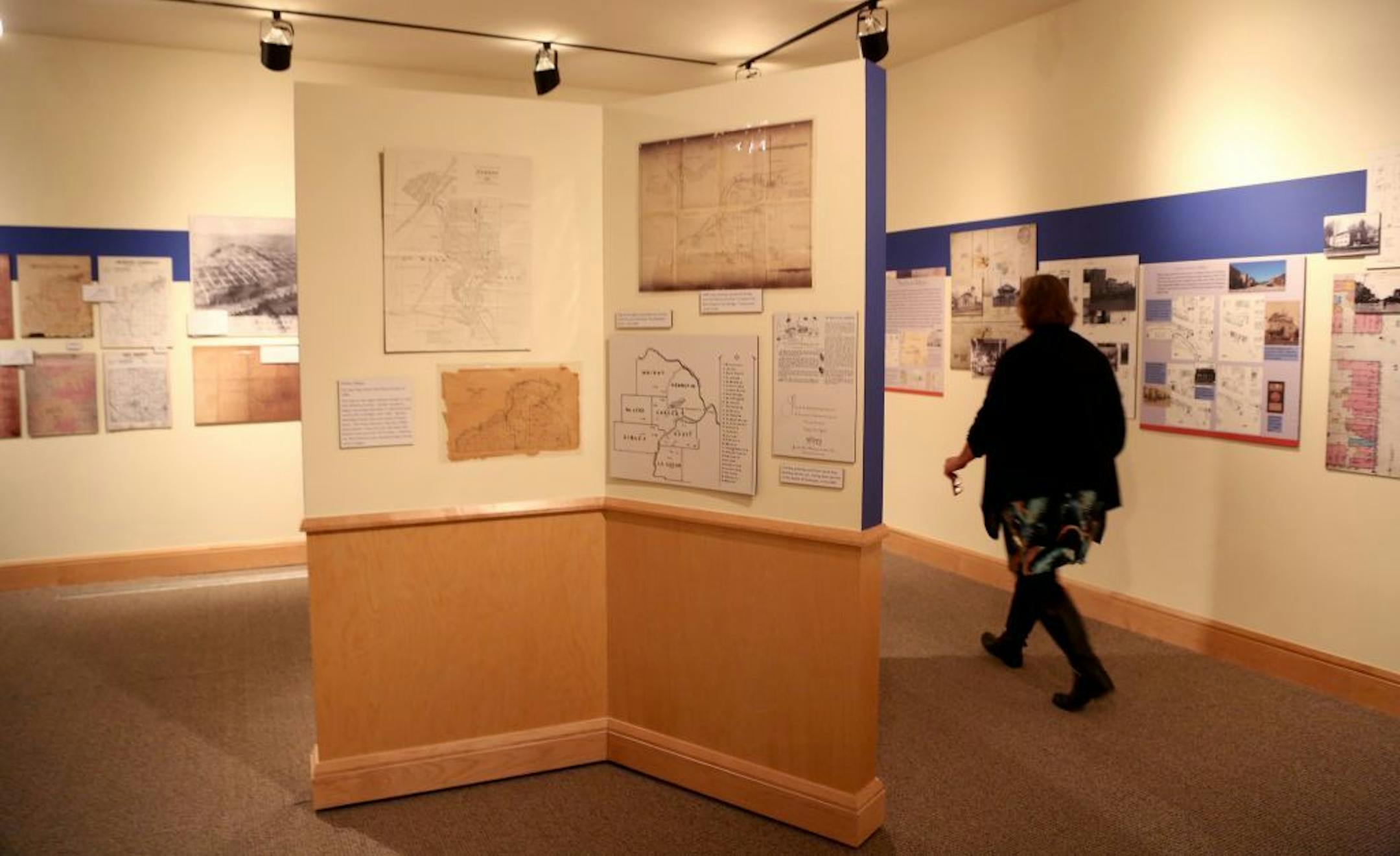 Kathy Klehr, executive director of the Scott County Historical Society walked toward the archive area where they store and catalog their items.