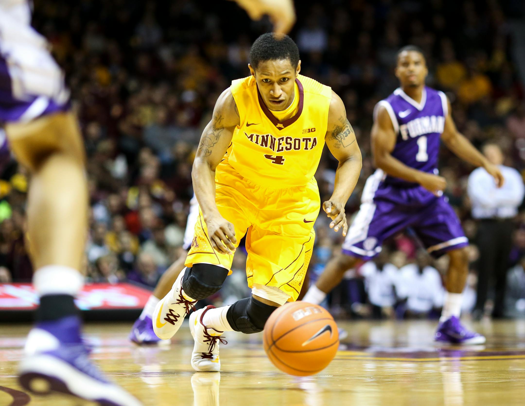 Gophers guard Deandre Mathieu scrambled after a loose ball during the first half against Furman at Williams Arena on Monday. Mathieu finished with 16 points and seven assists in an 86-76 victory.